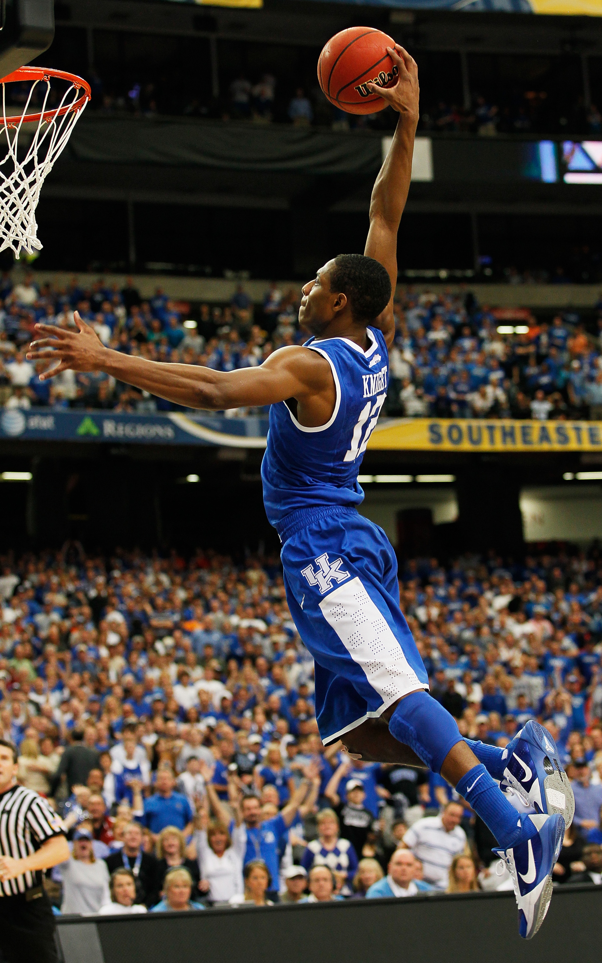 ATLANTA, GA - MARCH 13: Brandon Knight #12 of the Kentucky Wildcats dunks on the Florida Gators during the championship game of the SEC Men's Basketball Tournament at Georgia Dome on March 13, 2011 in Atlanta, Georgia. (Photo by Kevin C. Cox/Getty Image ATLANTA, GA - MARCH 13: Brandon Knight #12 of the Kentucky Wildcats dunks on the Florida Gators during the championship game of the SEC Men's Basketball Tournament at Georgia Dome on March 13, 2011 in Atlanta, Georgia. (Photo by Kevin C. Cox/Getty Image