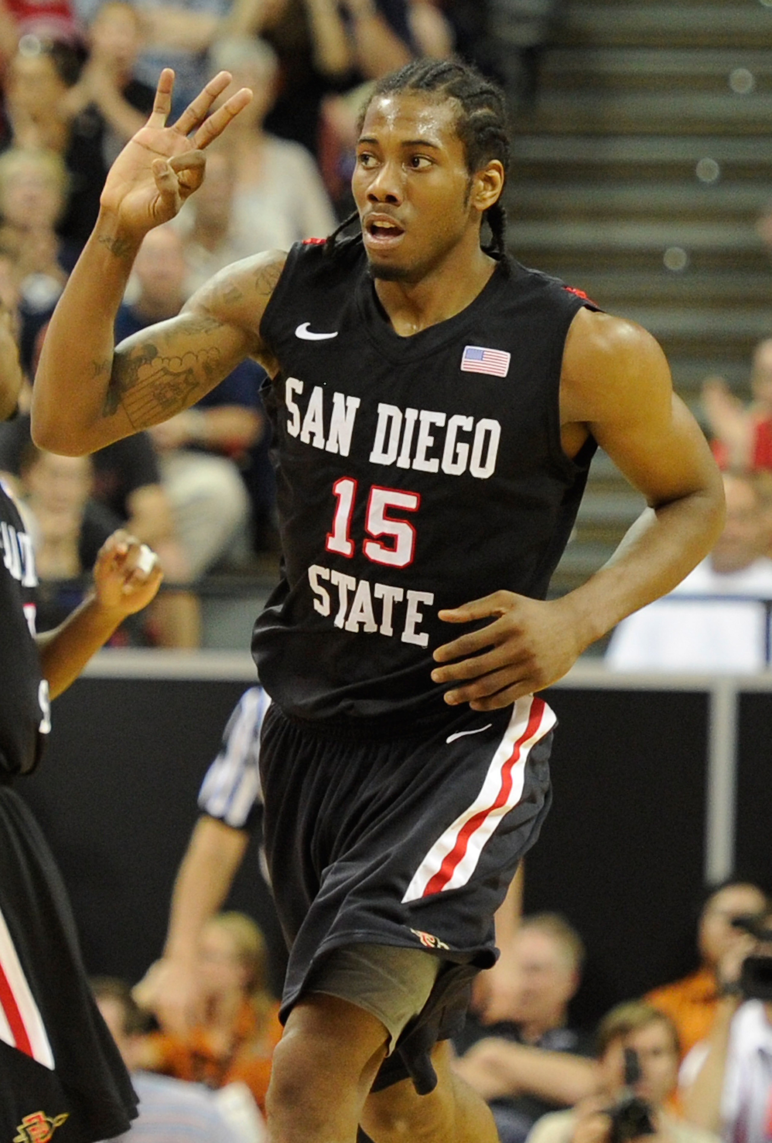 LAS VEGAS, NV - MARCH 12: Kawhi Leonard #15 of the San Diego State Aztecs holds up three fingers after scoring a three-point basket against the Brigham Young University Cougars during the championship game of the Conoco Mountain West Conference Basketbal LAS VEGAS, NV - MARCH 12: Kawhi Leonard #15 of the San Diego State Aztecs holds up three fingers after scoring a three-point basket against the Brigham Young University Cougars during the championship game of the Conoco Mountain West Conference Basketbal