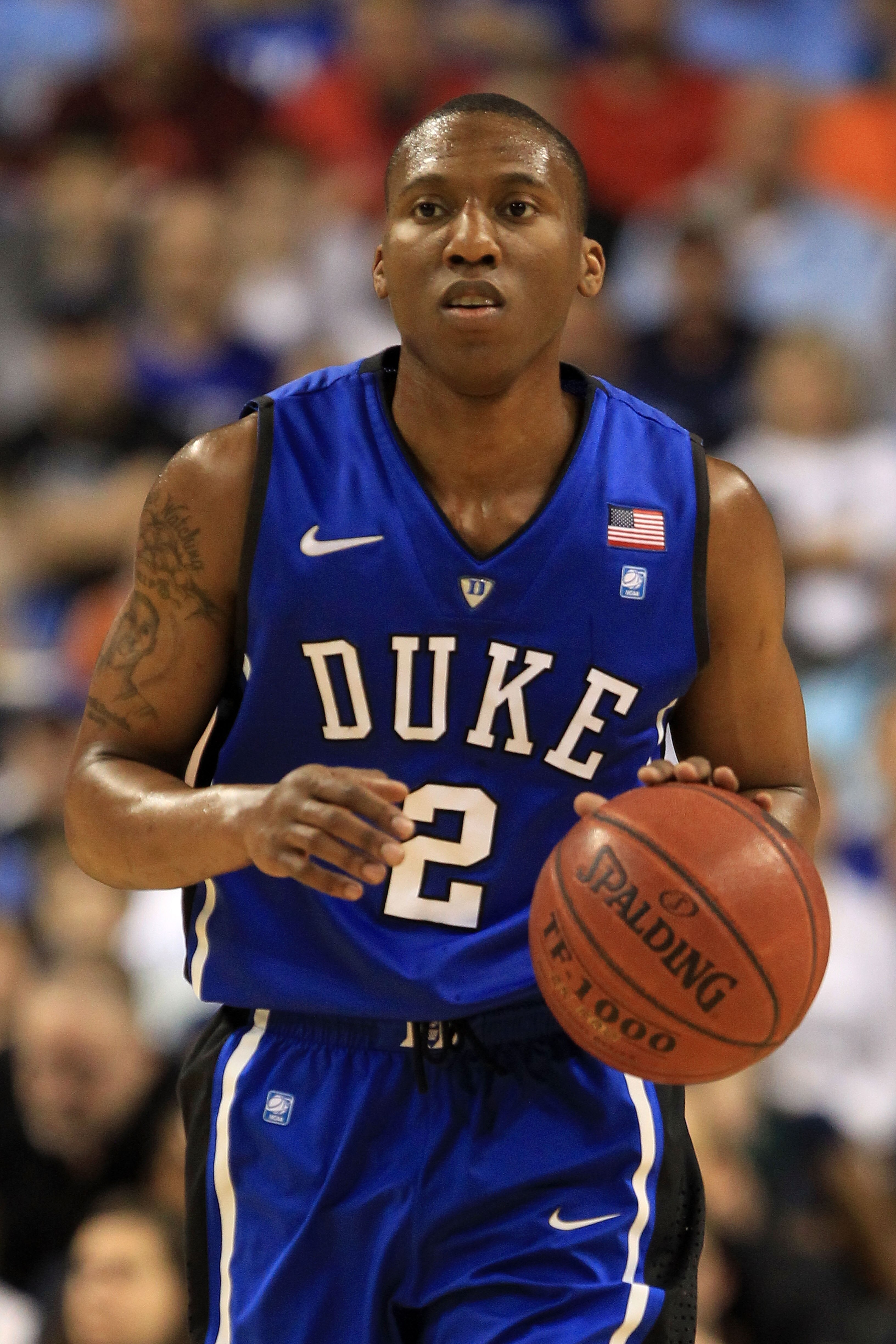 GREENSBORO, NC - MARCH 13:  Nolan Smith #2 of the Duke Blue Devils brings the ball up the court during the first half of the game against the North Carolina Tar Heels in the championship game of the 2011 ACC men's basketball tournament at the Greensboro C
