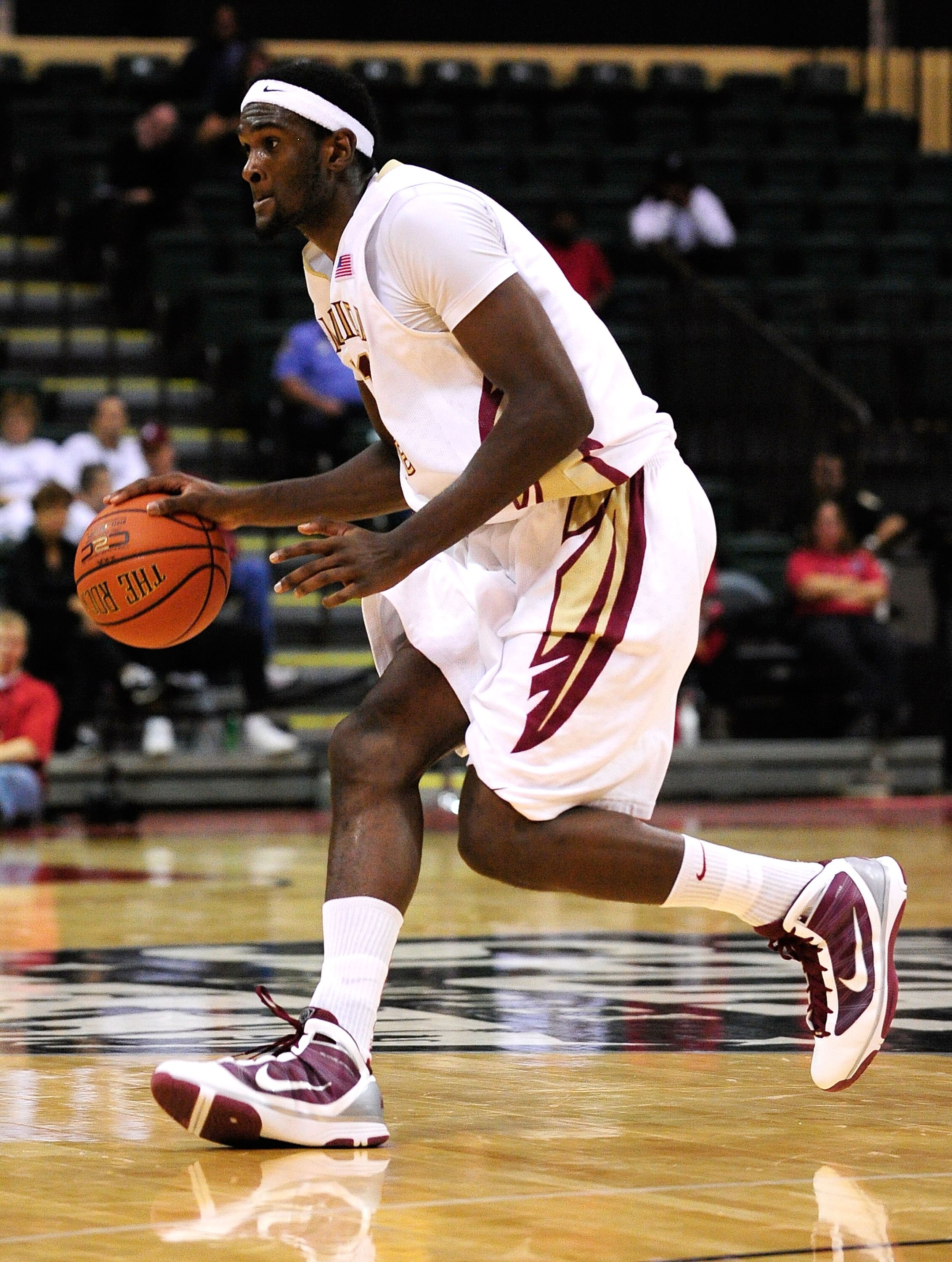 ORLANDO, FL - NOVEMBER 27:  Chris Singleton #31 of the Florida State Seminoles looks to pass against the Alabama Crimson Tide during the Old Spice Classic at Disney's Milk House on November 27, 2009 in Orlando, Florida.  (Photo by Sam Greenwood/Getty Imag