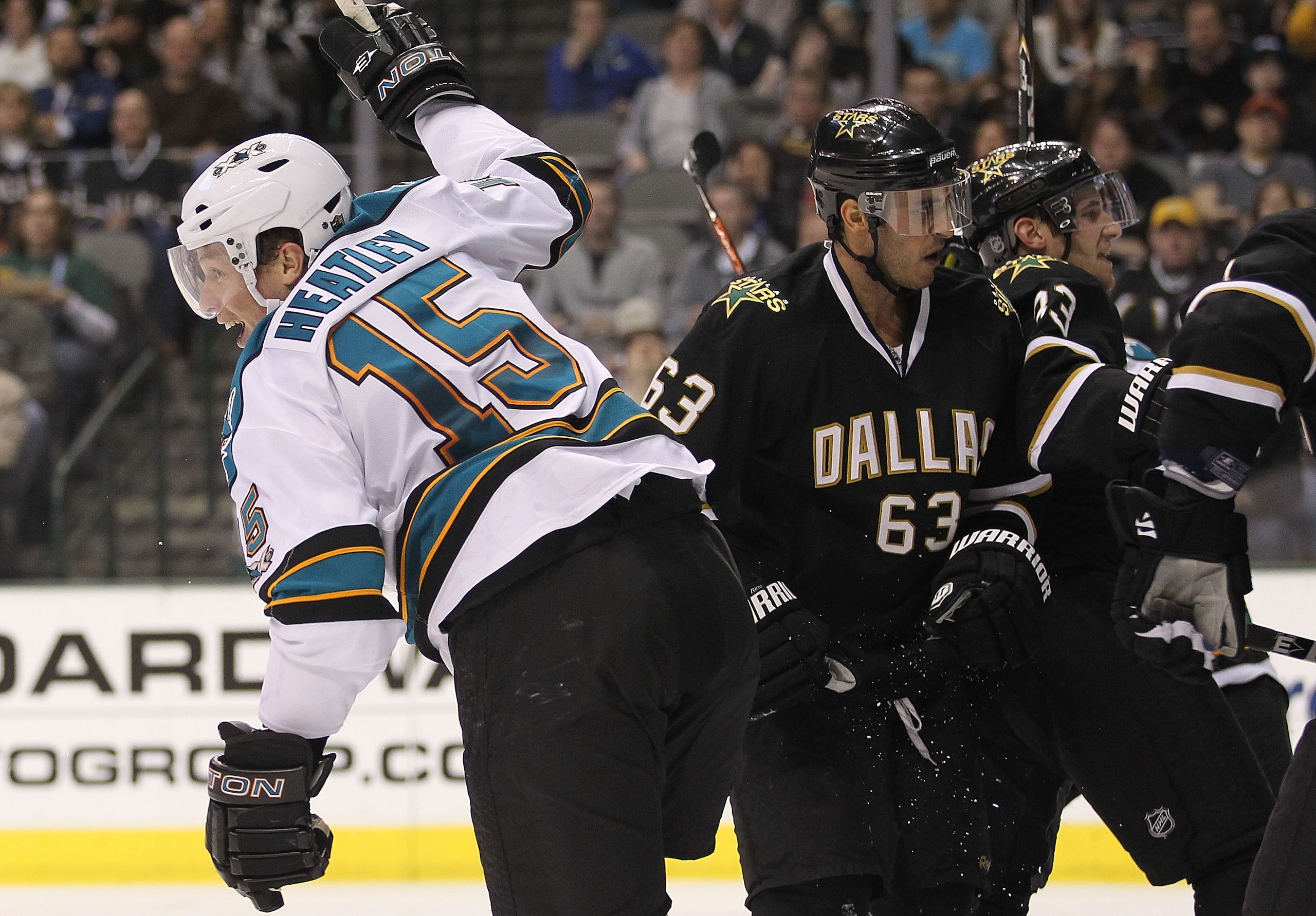 DALLAS, TX - MARCH 15:   Dany Heatley #15 of the San Jose Sharks celebrates a goal against the Dallas Stars at American Airlines Center on March 15, 2011 in Dallas, Texas.  (Photo by Ronald Martinez/Getty Images)