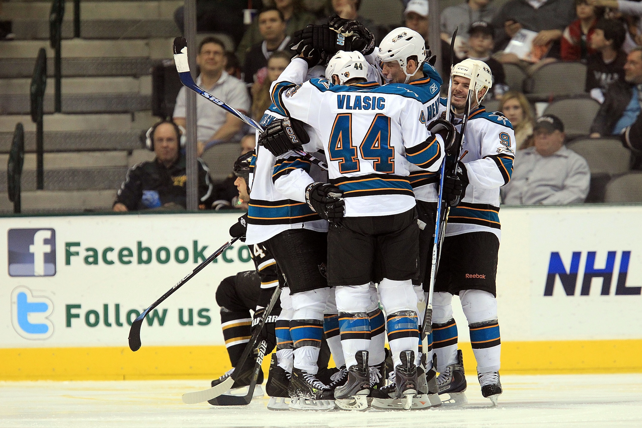 DALLAS, TX - MARCH 15:  The San Jose Sharks celebrate a goal against the Dallas Stars at American Airlines Center on March 15, 2011 in Dallas, Texas.  (Photo by Ronald Martinez/Getty Images)