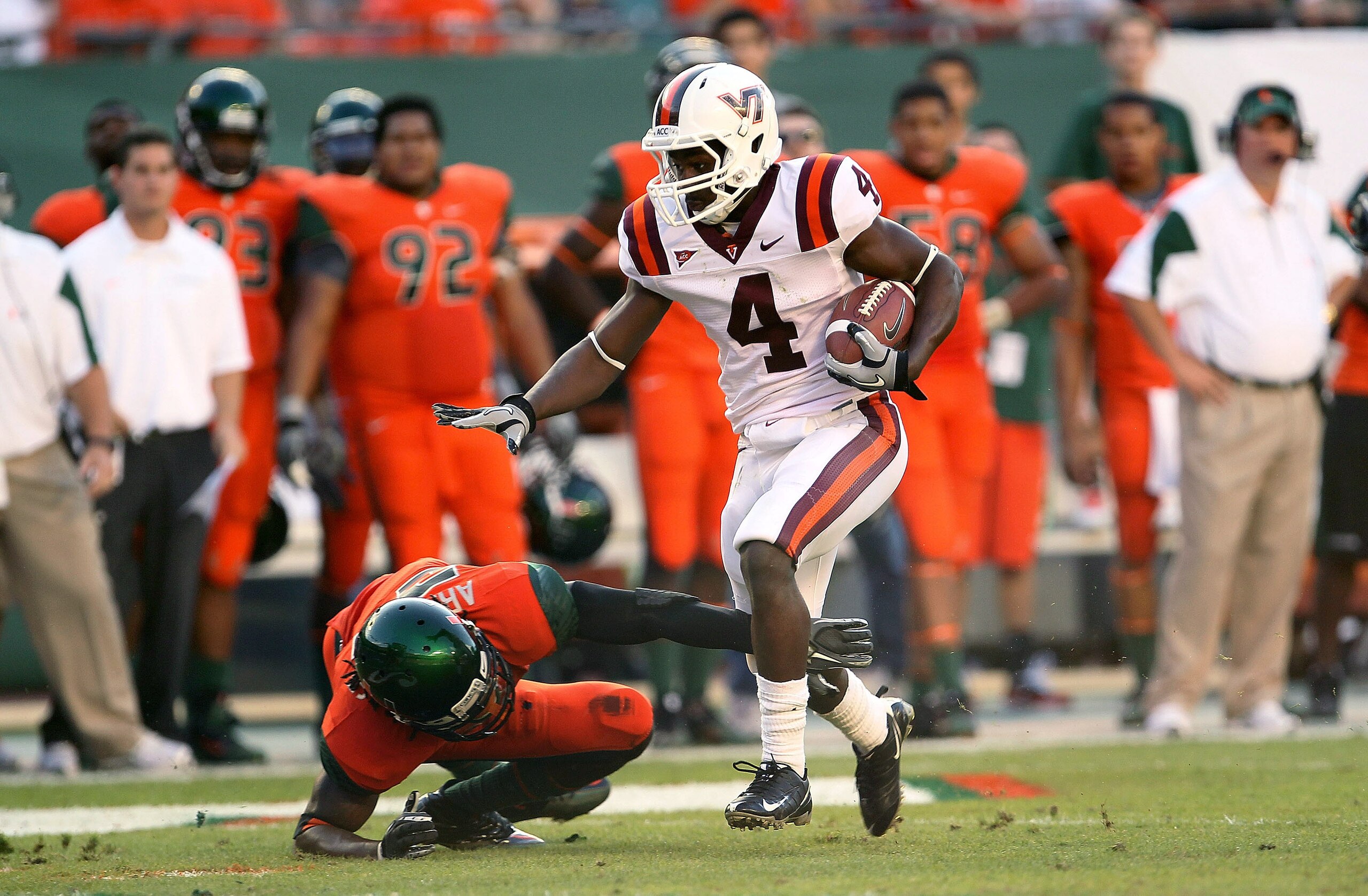 MIAMI - NOVEMBER 20:  David Wilson #4 of the Virginia Tech Hokies runs for a first down during a game against the Miami Hurricanes at Sun Life Stadium on November 20, 2010 in Miami, Florida.  (Photo by Mike Ehrmann/Getty Images)