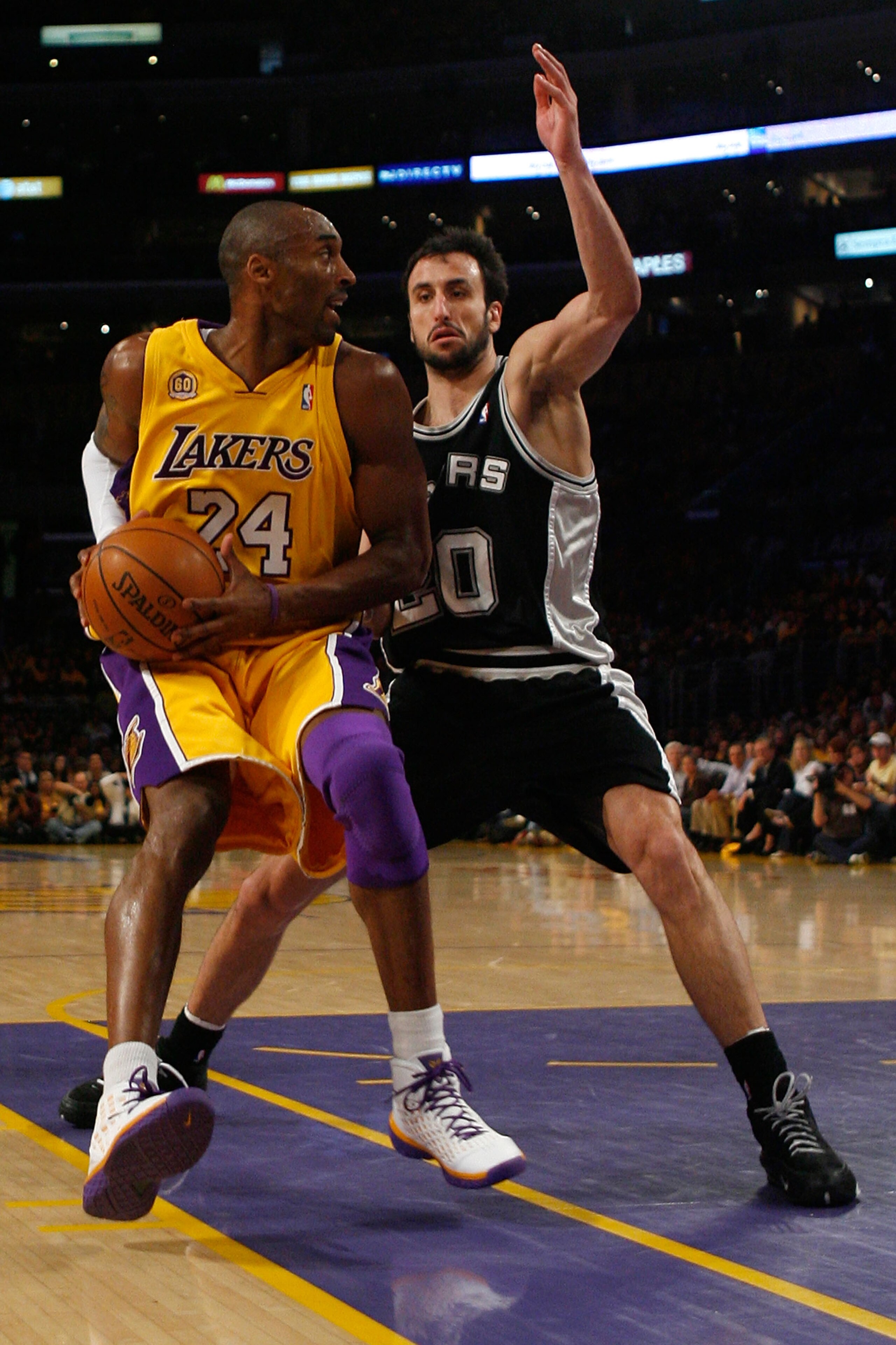 LOS ANGELES, CA - MAY 29:  Kobe Bryant #24 of the Los Angeles Lakers drives on Manu Ginobili #20 of the San Antonio Spurs in the first quarter of Game Five of the Western Conference Finals during the 2008 NBA Playoffs on May 29, 2008 at Staples Center in