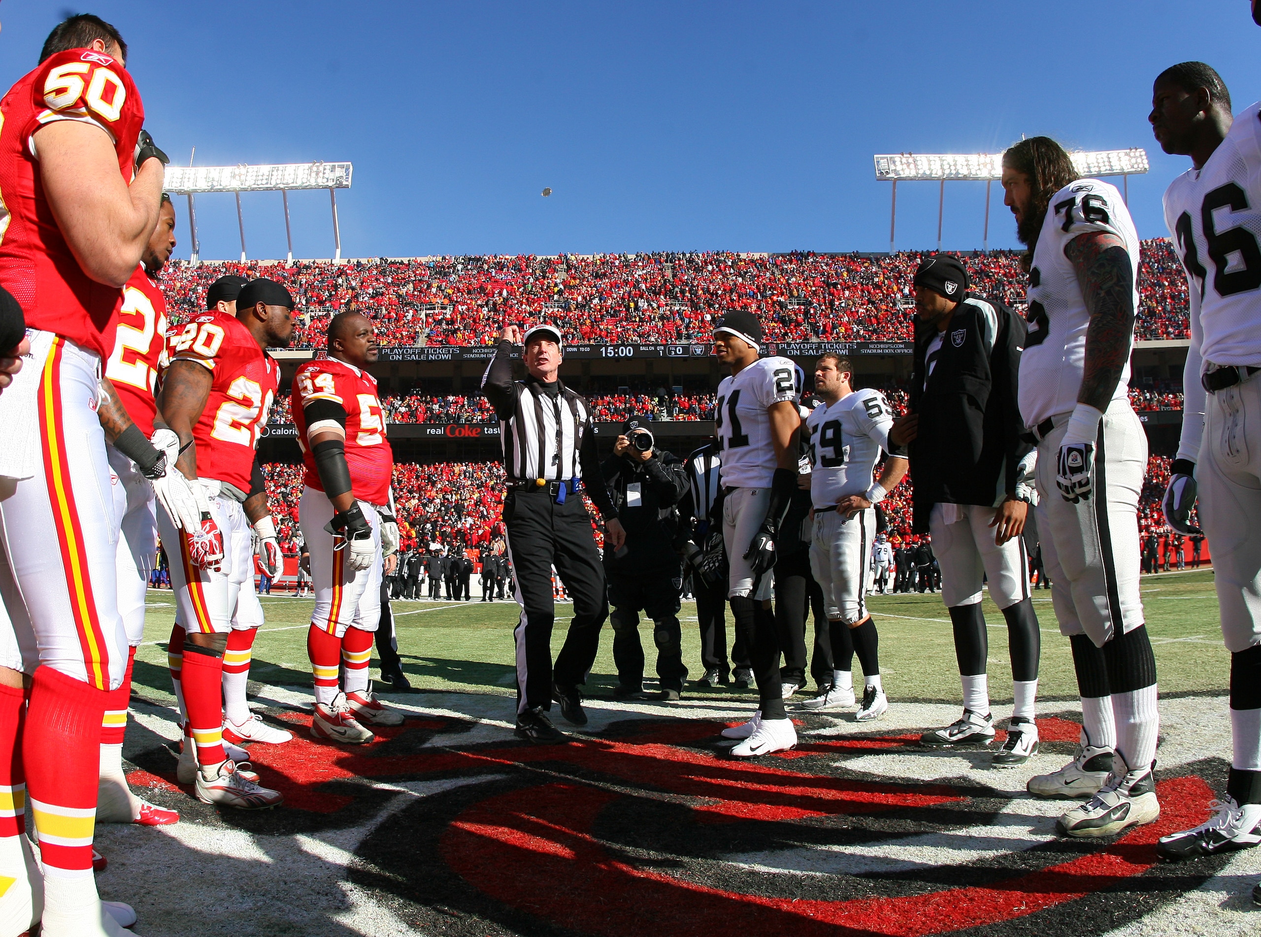 KANSAS CITY, MO - JANUARY 02:  Team captains for the Kansas City Chiefs and the Oakland Raiders meet for the coin toss before a game at Arrowhead Stadium on January 2, 2011 in Kansas City, Missouri.  (Photo by Tim Umphrey/Getty Images)