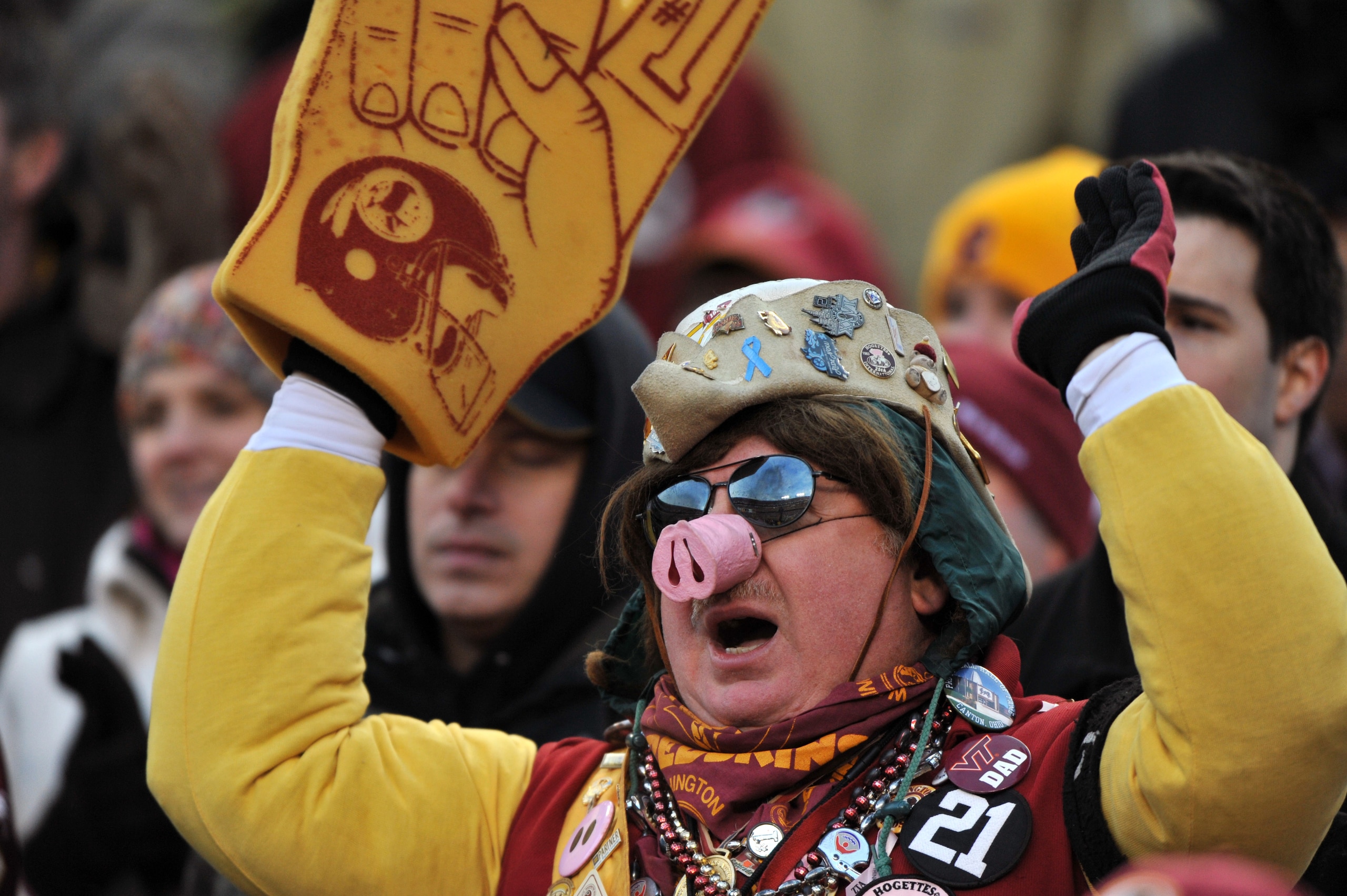 LANDOVER, MD - DECEMBER 6:  A fan of the Washington Redskins cheers against the New Orleans Saints at FedExField on December 6, 2009 in Landover, Maryland. The Saints defeated the Redskins in overtime 33-30. (Photo by Larry French/Getty Images)