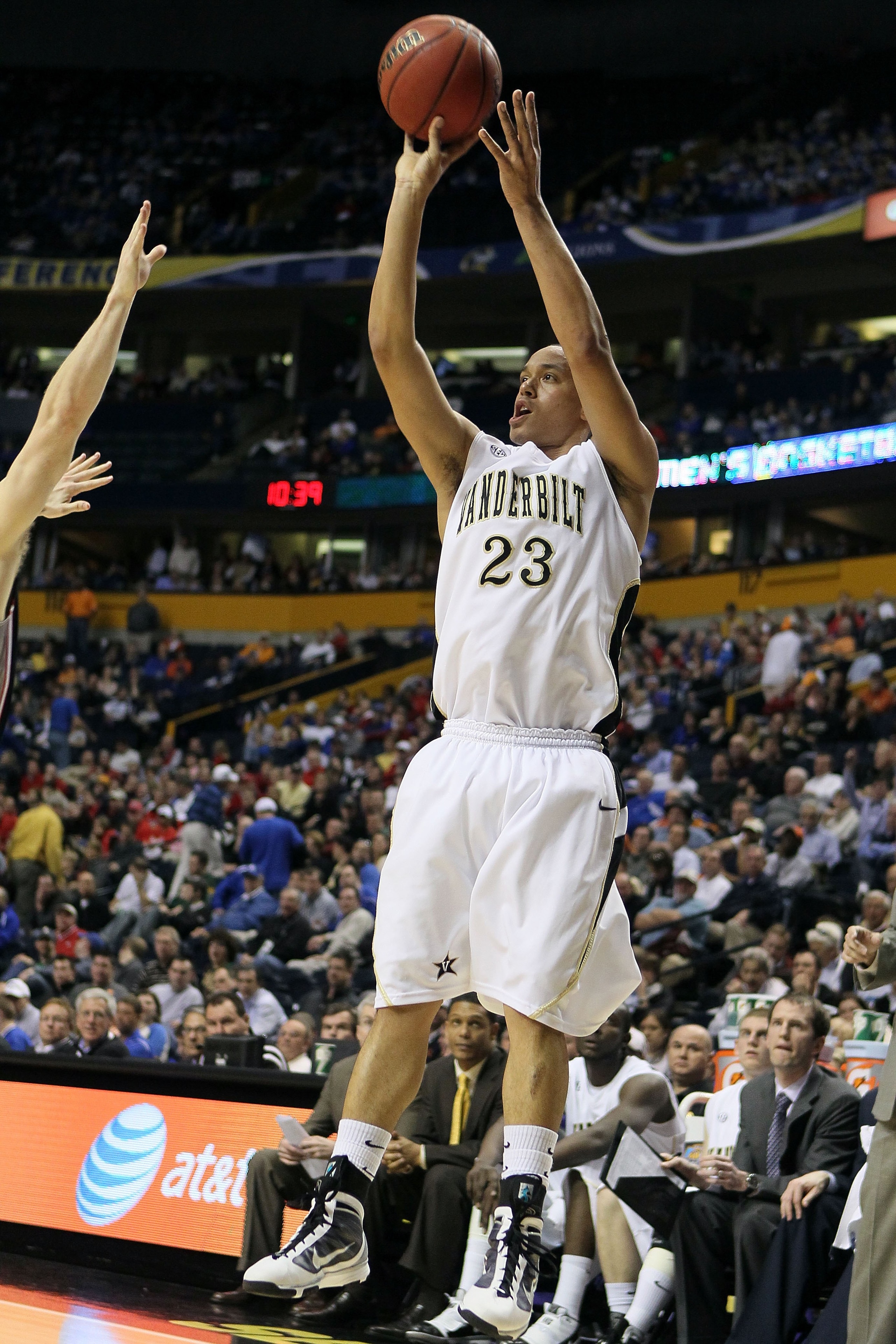 NASHVILLE, TN - MARCH 12:  John Jenkins #23 of the Vanderbilt Commodores attempts a shot against the Georgia Bulldogs during the quarterfinals of the SEC Men's Basketball Tournament at the Bridgestone Arena on March 12, 2010 in Nashville, Tennessee.  (Pho