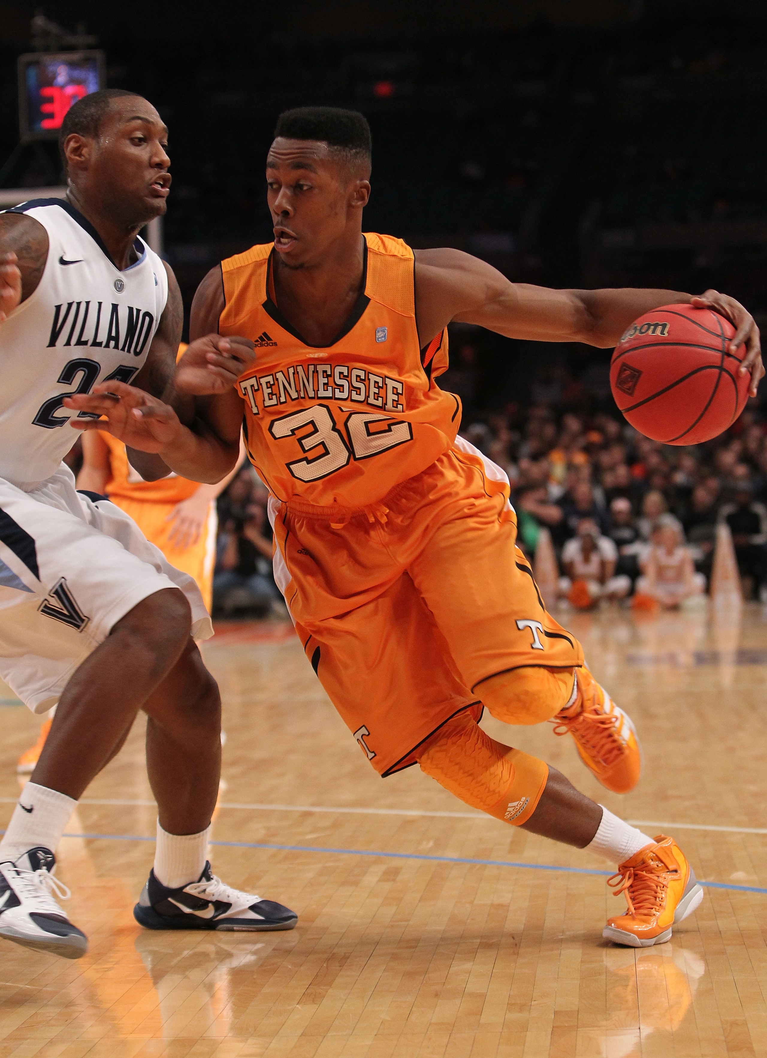 NEW YORK - NOVEMBER 26:  Scotty Hopson #32 of the Tennessee Volunteers drives to the basket against Corey Stokes #24 of the Villanova Wildcats  during the Championship game at Madison Square Garden on November 26, 2010 in New York City.  (Photo by Nick La