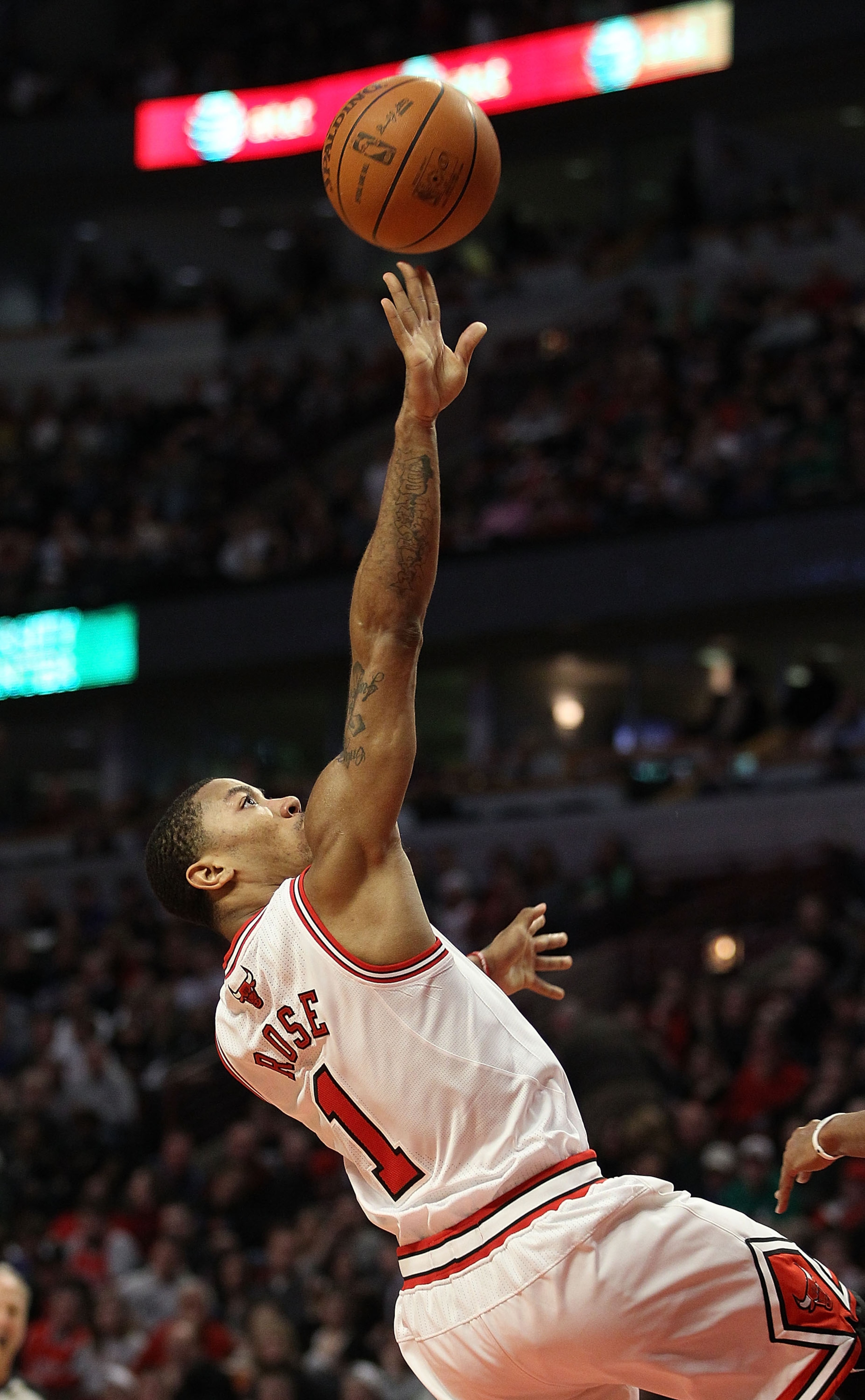 CHICAGO, IL - MARCH 12: Derrick Rose #1 of the Chicago Bulls puts up a shot against the Utah Jazz at the United Center on March 12, 2011 in Chicago, Illinois. The Bulls defeated the Jazz 118-100. NOTE TO USER: User expressly acknowledges and agrees that,