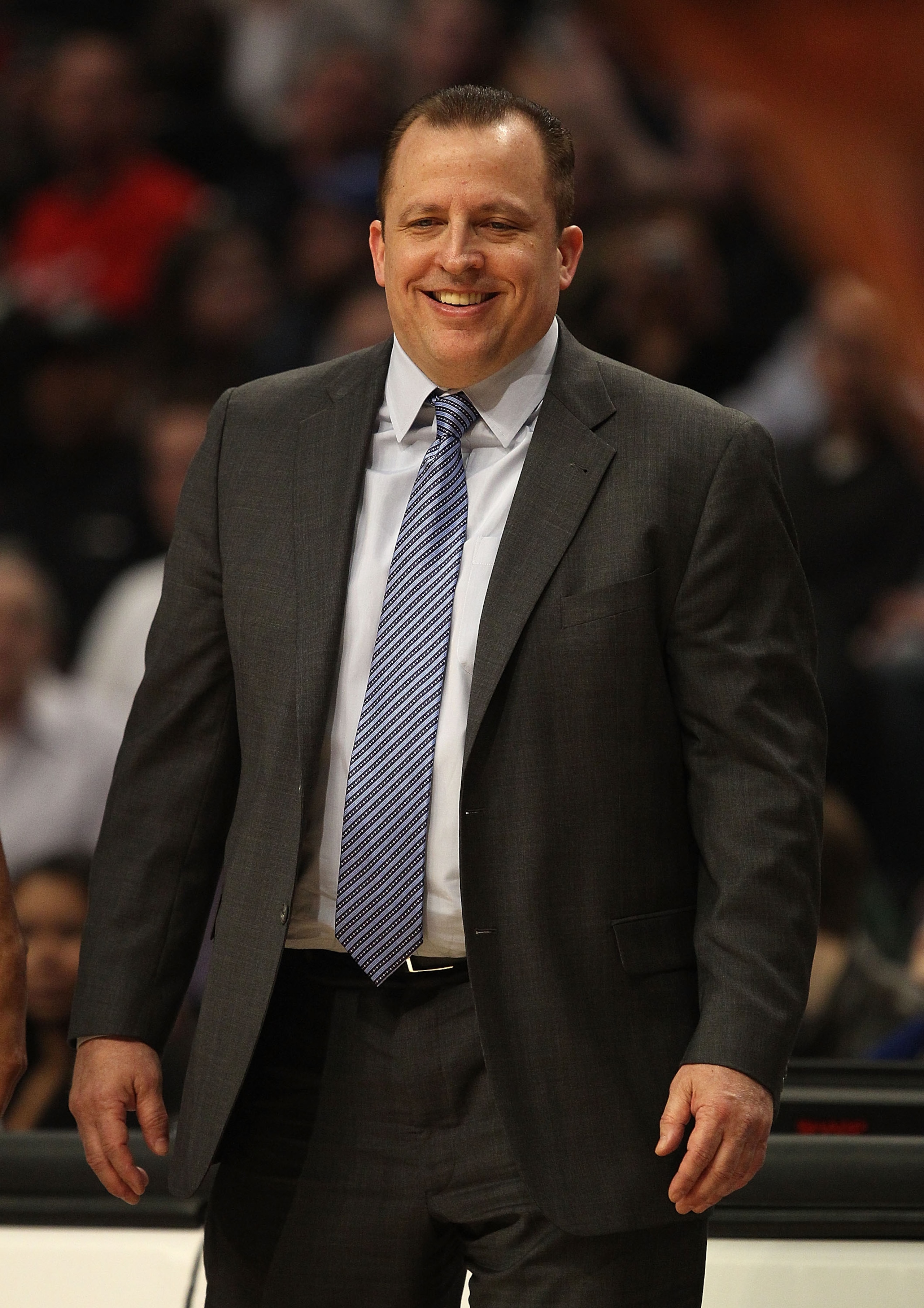 CHICAGO, IL - MARCH 12: Head coach Tom Thibodeau of the Chicago Bulls smiles as he watches his team take on the Utah Jazz at the United Center on March 12, 2011 in Chicago, Illinois. The Bulls defeated the Jazz 118-100. NOTE TO USER: User expressly acknow