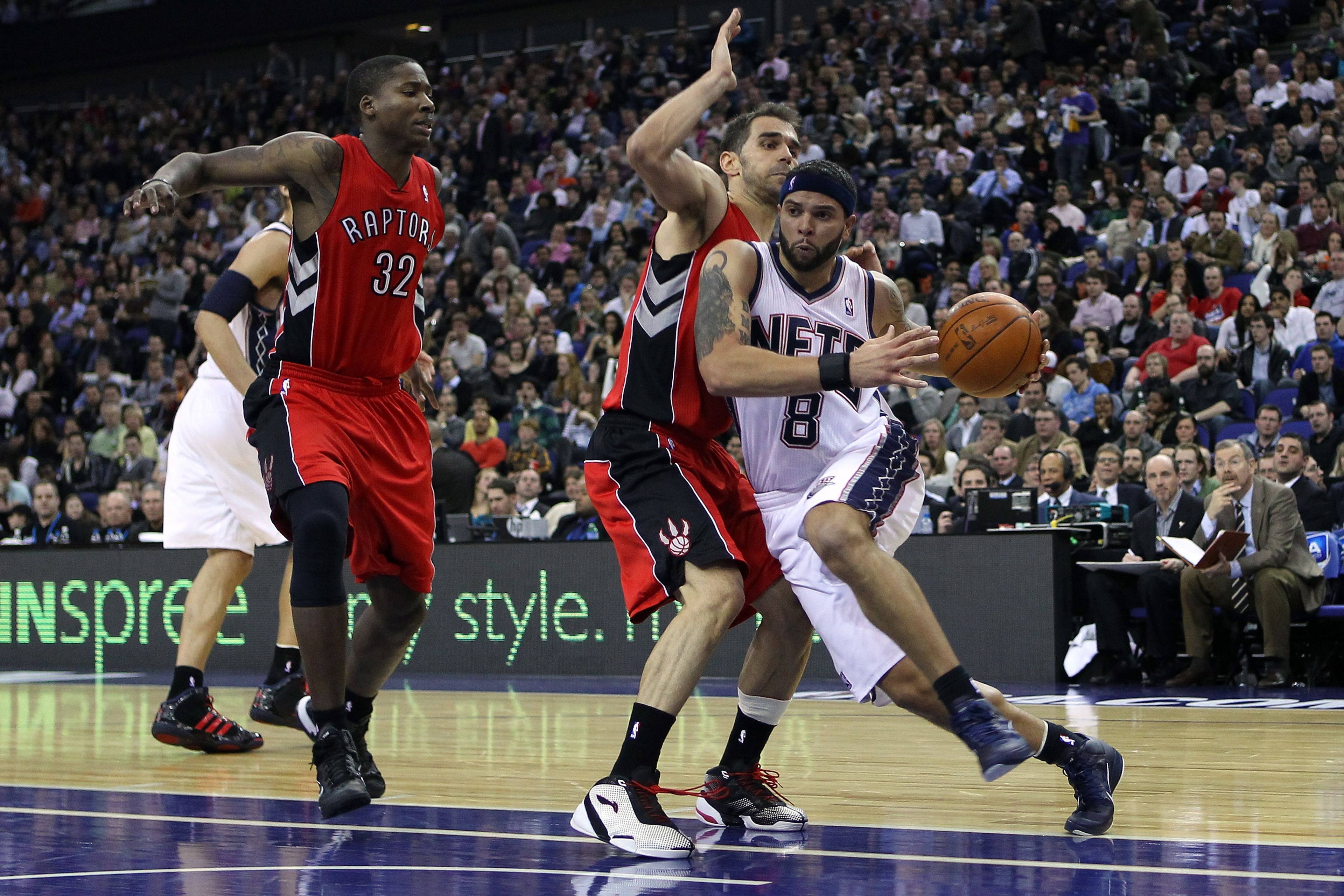LONDON, ENGLAND - MARCH 04:  Deron Williams of the Nets runs past the Raptors defence during the NBA match between New Jersey Nets and the Toronto Raptors at the O2 Arena on March 4, 2011 in London, England. NOTE TO USER: User expressly acknowledges and a