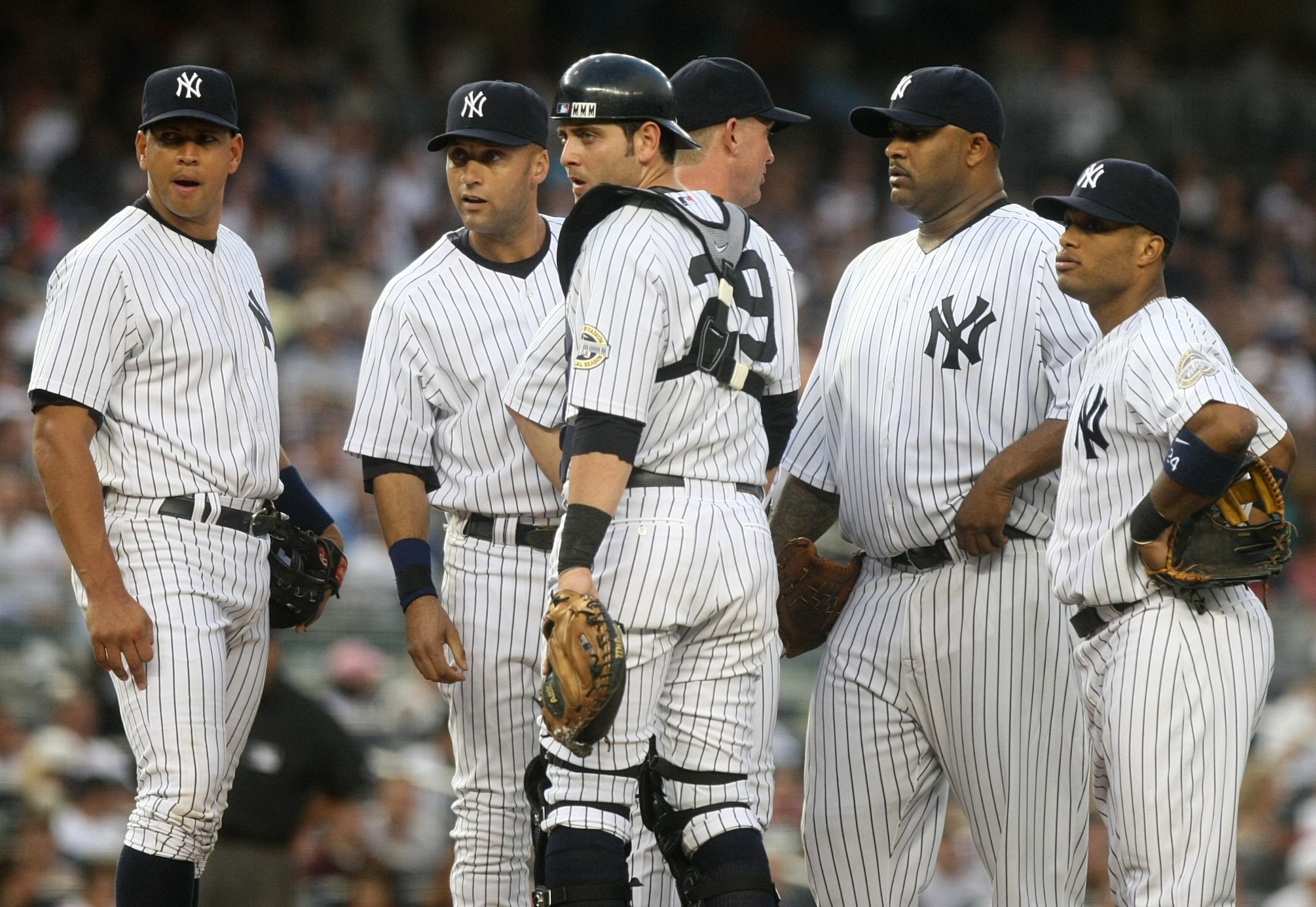 NEW YORK - JULY 2: (L-R) Alex Rodriguez #13, Derek Jeter #2, Francisco Cervelli #29, pitching coach Dave Eiland #58, CC Sabathia #55 and Robinson Cano #24 of the New York Yankees meet on the mound during action against the Seattle Mariners at Yankee Stadi