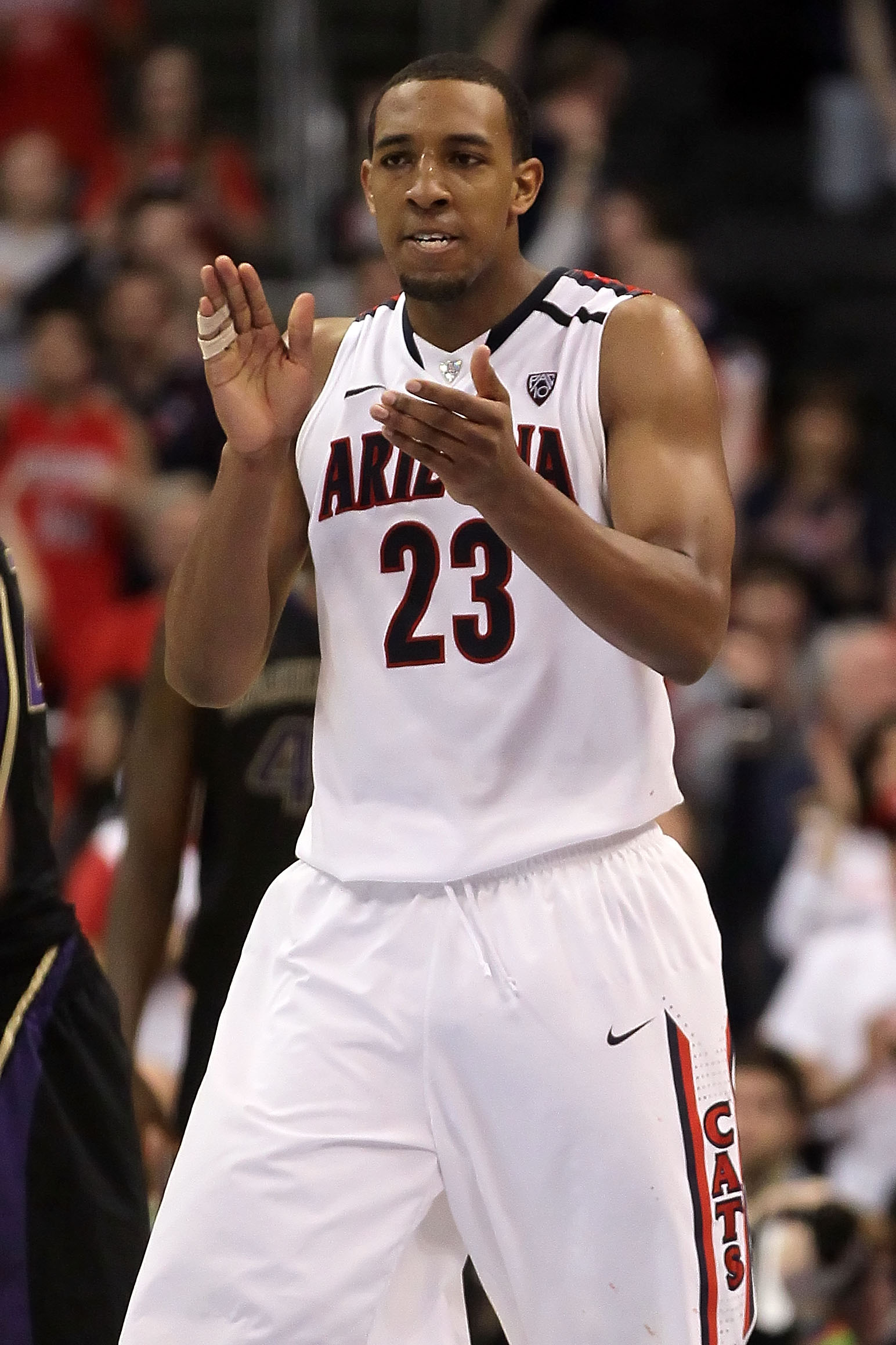 LOS ANGELES, CA - MARCH 12: Derrick Williams #23 of the Arizona Wildcats reacts in the second half while taking on the Washington Huskies in the championship game of the 2011 Pacific Life Pac-10 Men's Basketball Tournament at Staples Center on March 12,