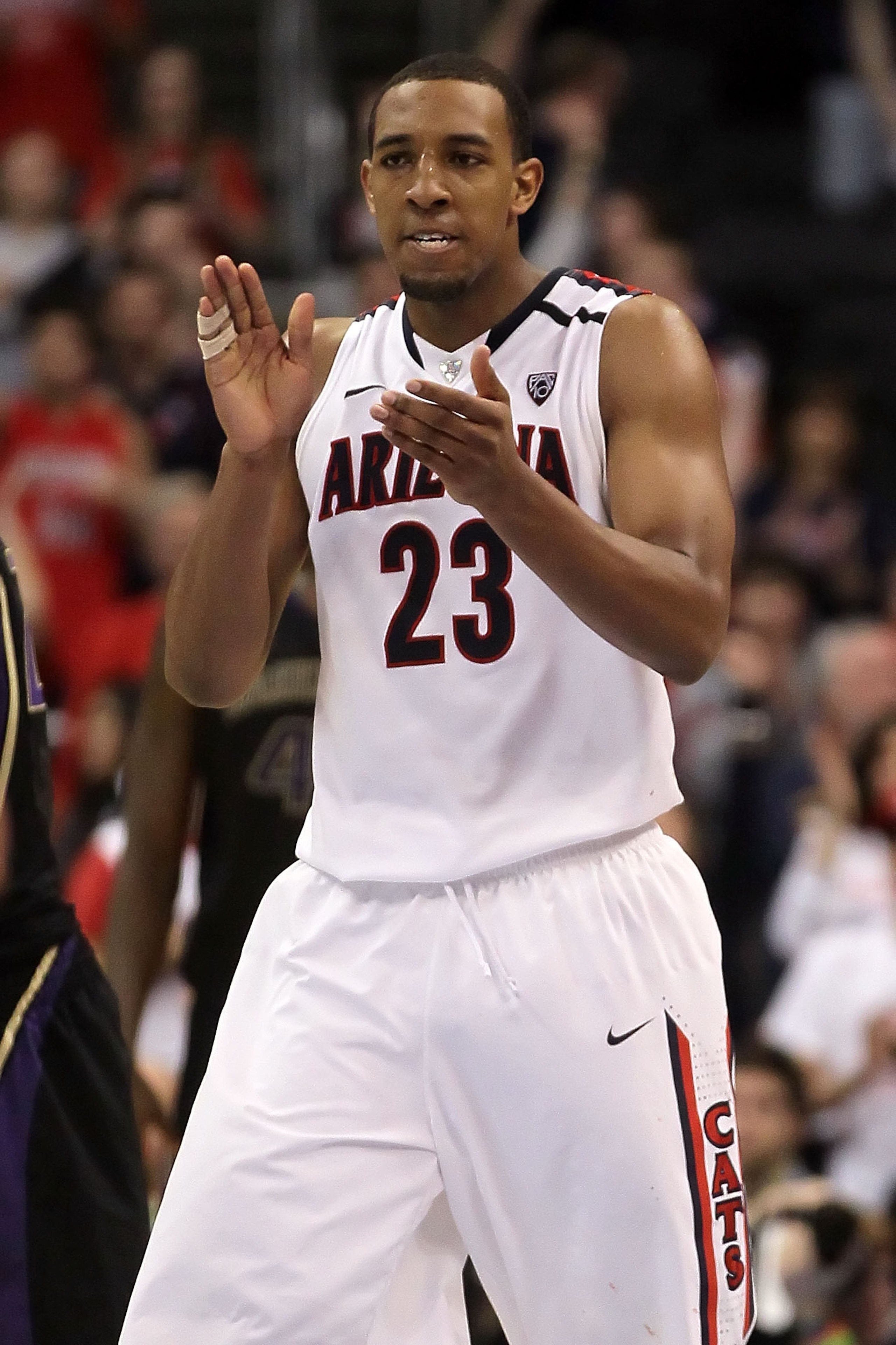 LOS ANGELES, CA - MARCH 12:  Derrick Williams #23 of the Arizona Wildcats reacts in the second half while taking on the Washington Huskies in the championship game of the 2011 Pacific Life Pac-10 Men's Basketball Tournament at Staples Center on March 12,