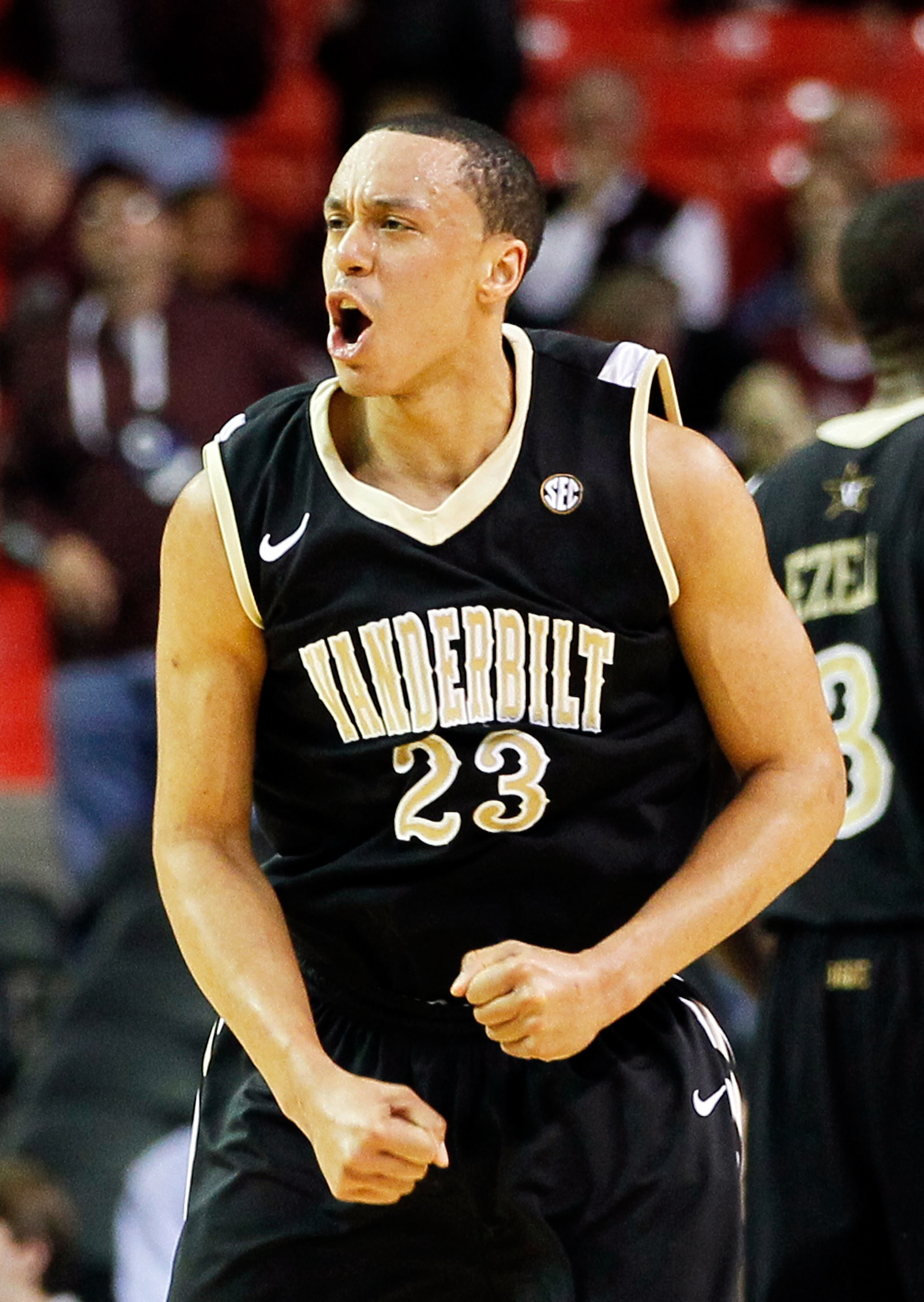 ATLANTA, GA - MARCH 11:  John Jenkins #23 of the Vanderbilt Commodores celebrates their win over the Mississippi State Bulldogs during the quarterfinals of the SEC Men's Basketball Tournament at Georgia Dome on March 11, 2011 in Atlanta, Georgia. The Comm