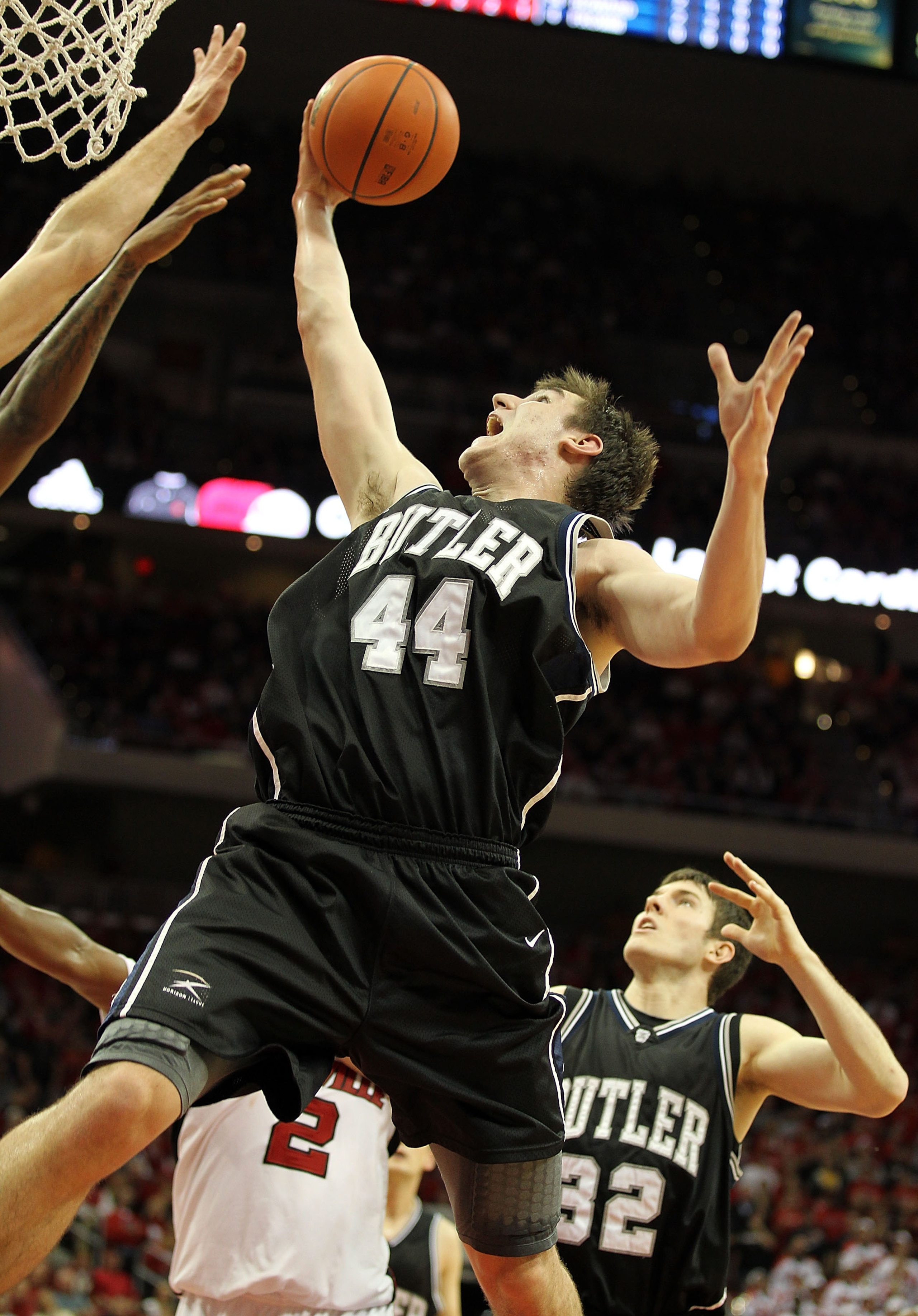 LOUISVILLE, KY - NOVEMBER 16: Matt Howard #54  of the Butler Bulldogs grabs a rebound during the game against the Louisville Cardinals at the KFC Yum! Center on November 16, 2010 in Louisville, Kentucky.  (Photo by Andy Lyons/Getty Images)