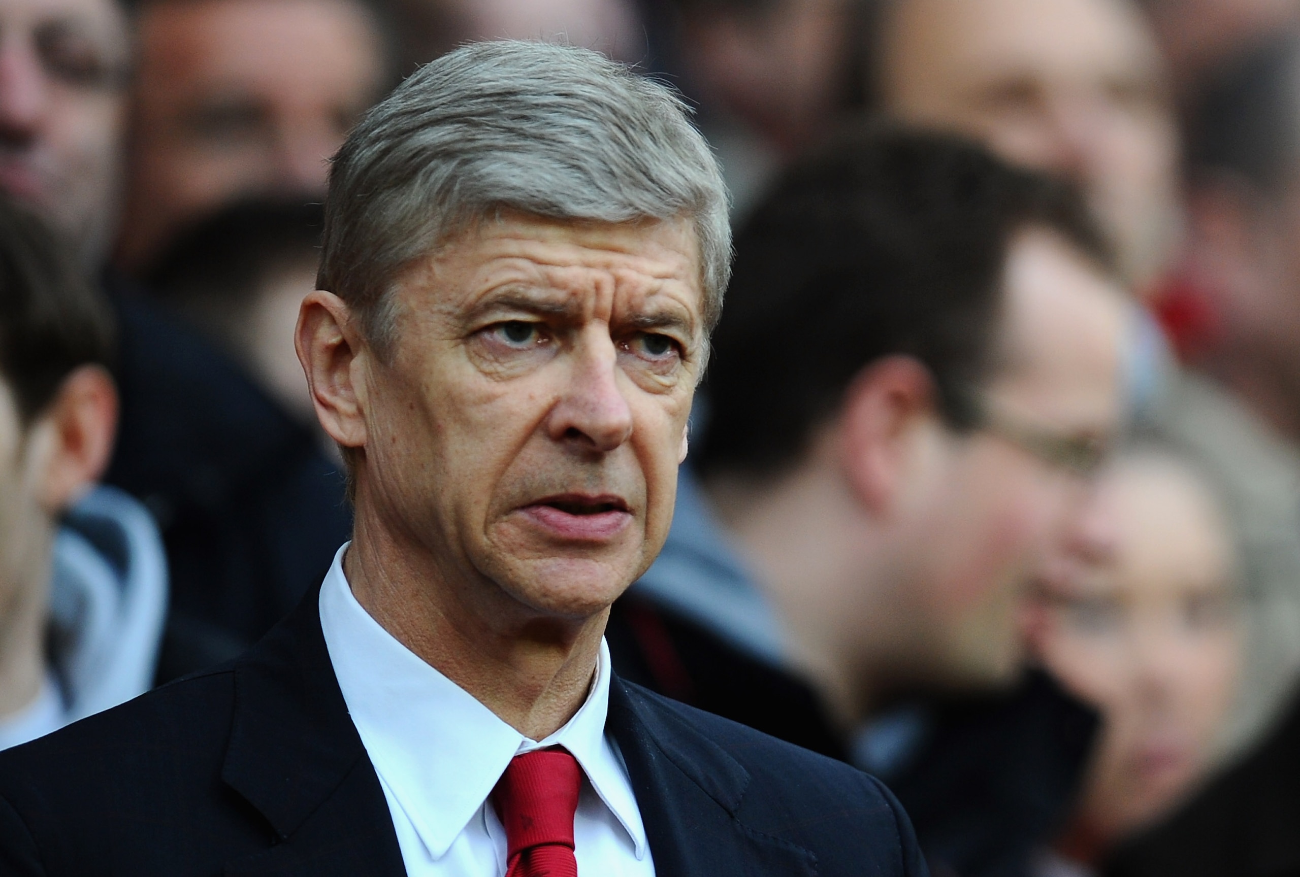 MANCHESTER, ENGLAND - MARCH 12: Arsenal manager Arsene Wenger looks on ahead of the FA Cup sponsored by E.On Sixth Round match between Manchester United and Arsenal at Old Trafford on March 12, 2011 in Manchester, England. (Photo by Clive Mason/Getty Im MANCHESTER, ENGLAND - MARCH 12: Arsenal manager Arsene Wenger looks on ahead of the FA Cup sponsored by E.On Sixth Round match between Manchester United and Arsenal at Old Trafford on March 12, 2011 in Manchester, England. (Photo by Clive Mason/Getty Im