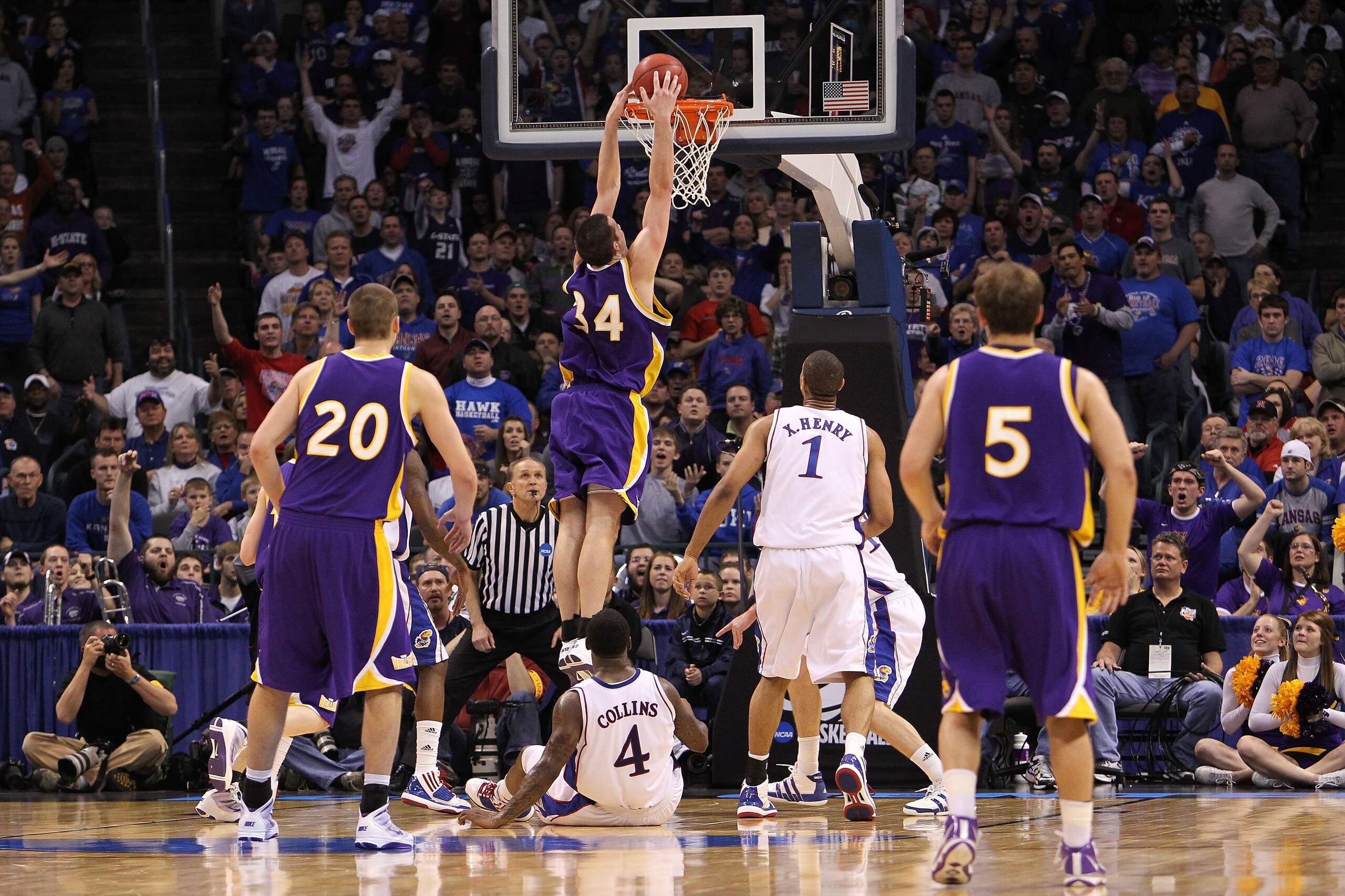 OKLAHOMA CITY - MARCH 20:  Adam Koch #34 the Northern Iowa Panthers dunks against the Kansas Jayhawks during the second round of the 2010 NCAA men's basketball tournament at Ford Center on March 20, 2010 in Oklahoma City, Oklahoma.  (Photo by Ronald Marti