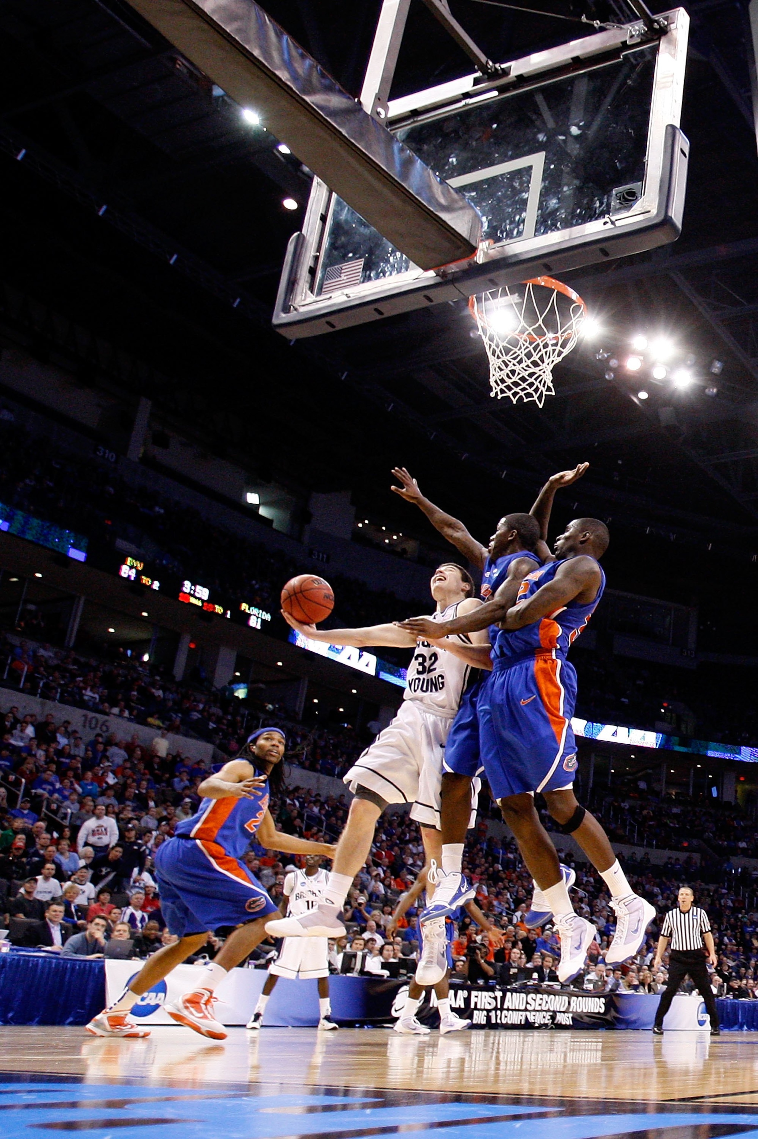 OKLAHOMA CITY - MARCH 18:  Jimmer Fredette #32 of the BYU Cougars drives for a shot attempt against the Florida Gators during the first round of the 2010 NCAA menï¿½s basketball tournament at Ford Center on March 18, 2010 in Oklahoma City, Oklahoma.  (Photo