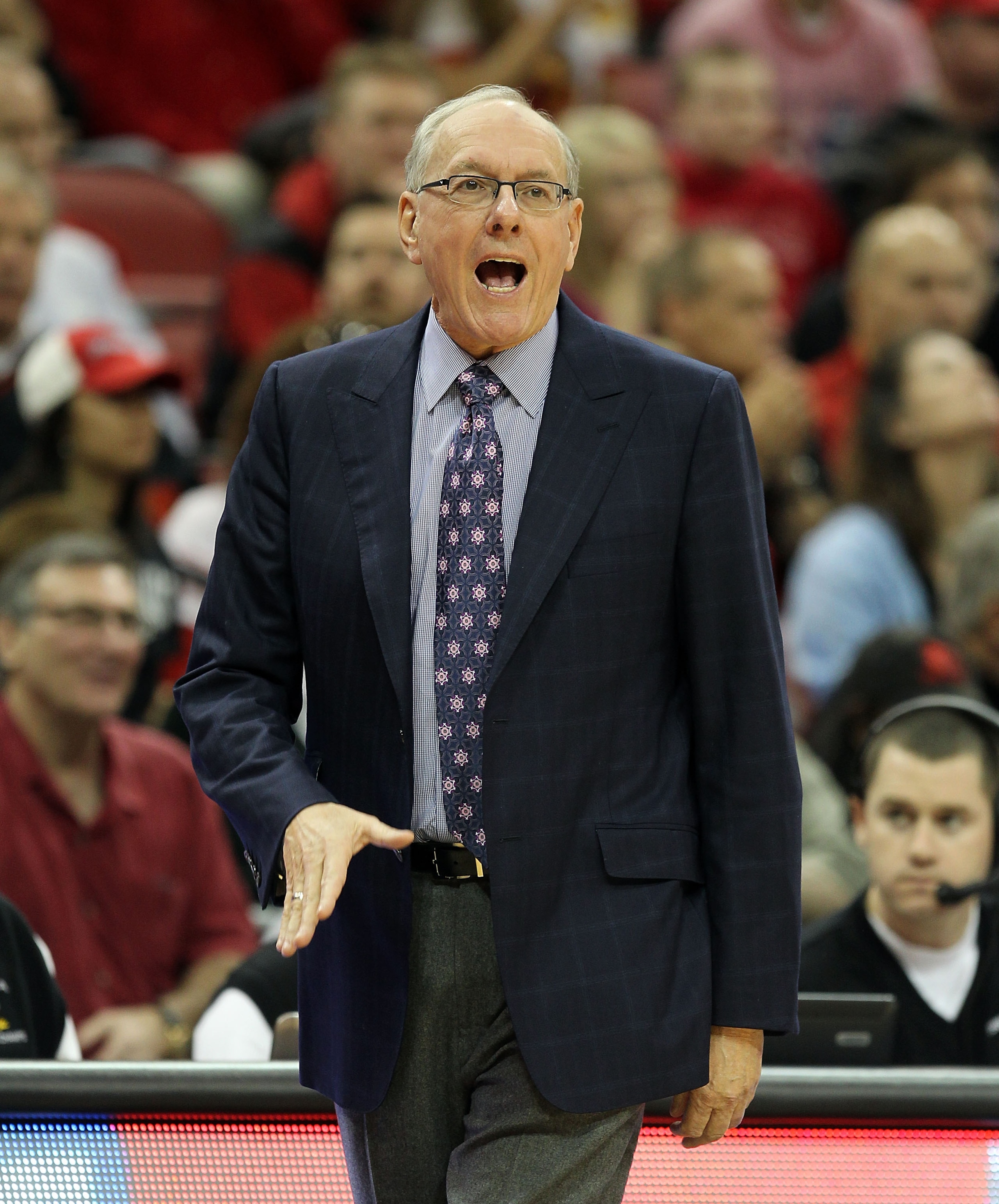 LOUISVILLE, KY - FEBRUARY 12:  Jim Boeheim the Head Coach of the Syracuse Orange gives instructions to his team during the Big East Conference game against the Louisville Cardinals at the KFC Yum! Center on February 12, 2011 in Louisville, Kentucky.  Loui