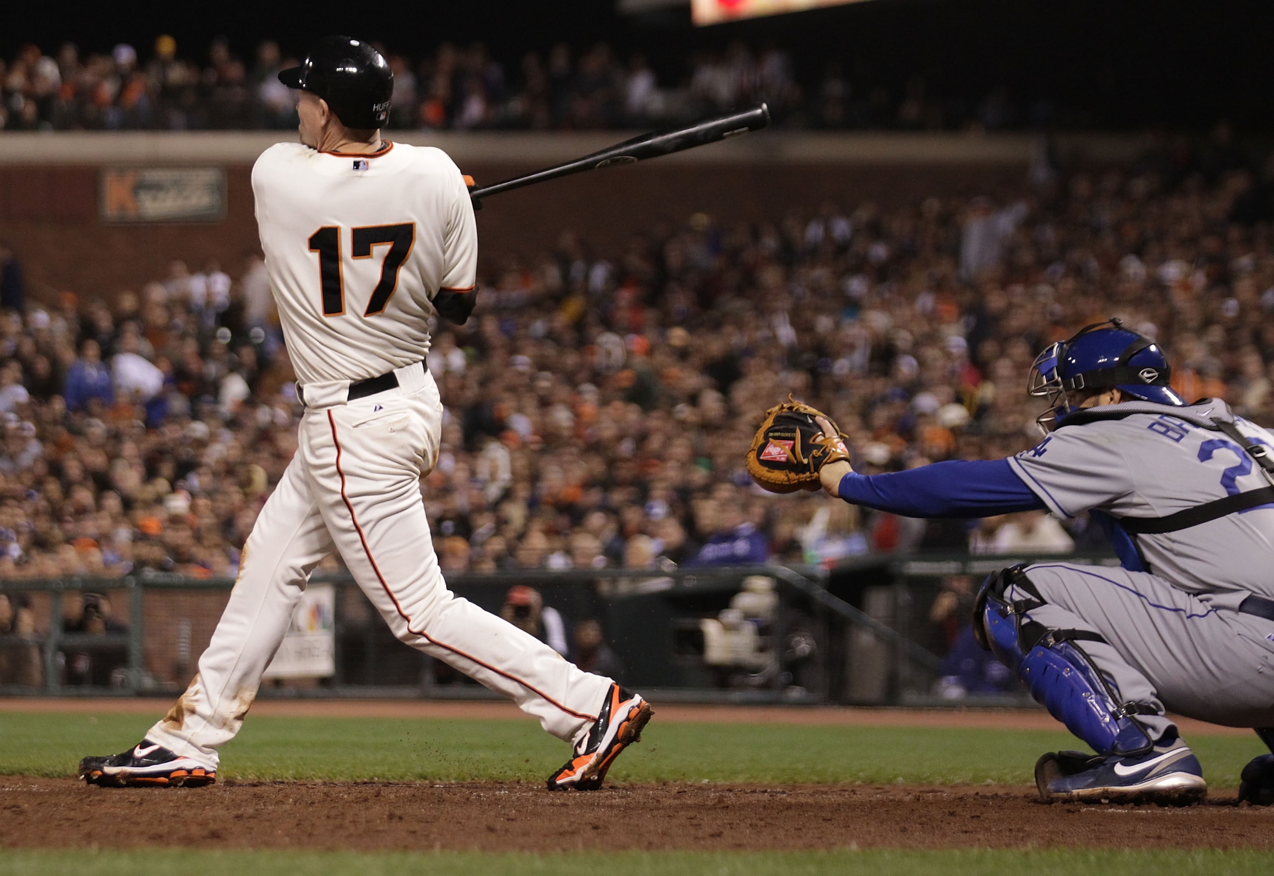 SAN FRANCISCO - SEPTEMBER 16:  Aubrey Huff #17 of the San Francisco Giants hits a three run home run against the Los Angeles Dodgers in the third inning during a Major League Baseball game at AT&T Park on September 16, 2010 in San Francisco, California.