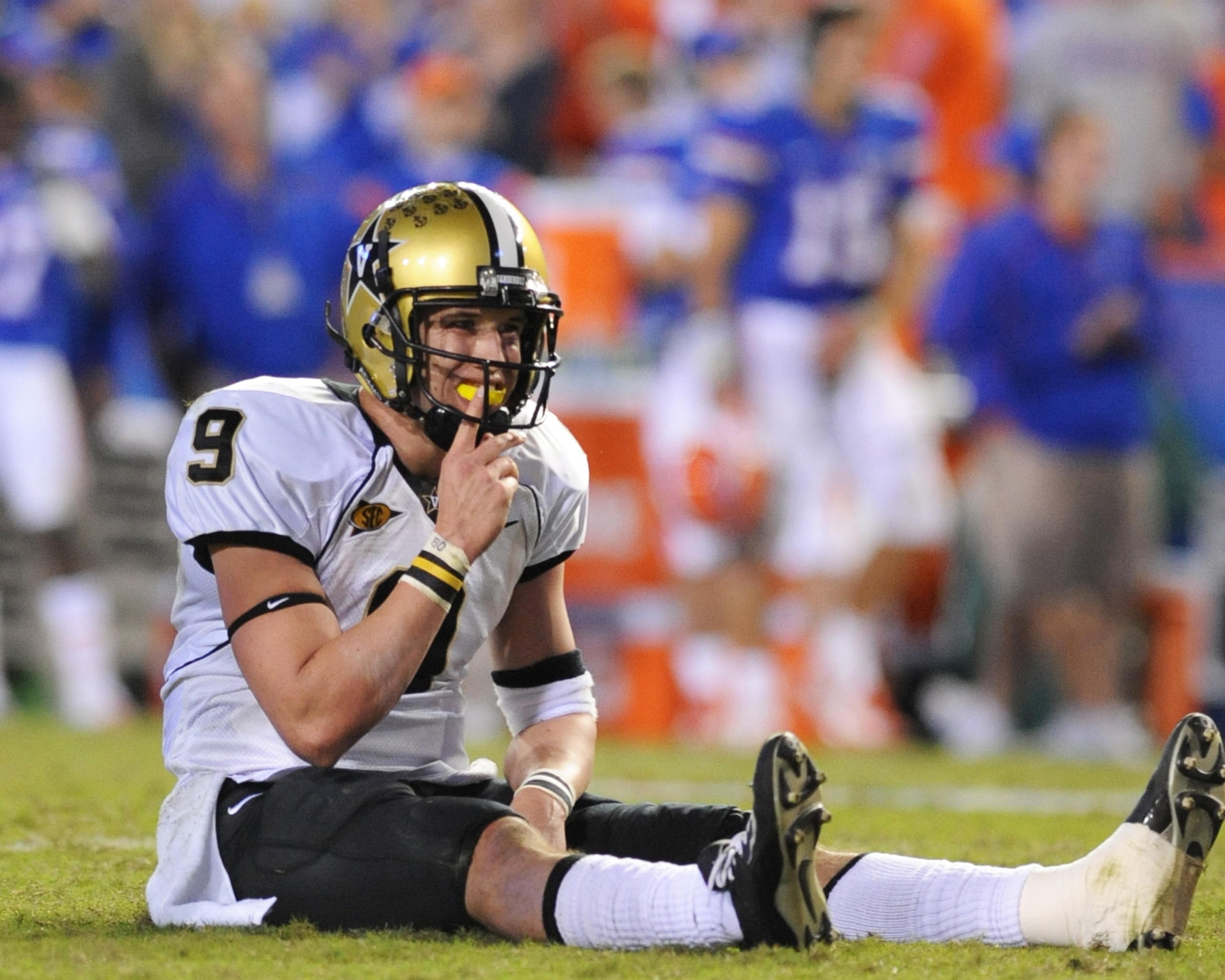 GAINESVILLE, FL - NOVEMBER 7: Quarterback Mackenzi Adams #9 of the Vanderbilt Commodores after a sack by the Florida Gators on November 7, 2009 at Ben Hill Griffin Stadium in Gainesville, Florida. (Photo by Al Messerschmidt/Getty Images) GAINESVILLE, FL - NOVEMBER 7: Quarterback Mackenzi Adams #9 of the Vanderbilt Commodores after a sack by the Florida Gators on November 7, 2009 at Ben Hill Griffin Stadium in Gainesville, Florida. (Photo by Al Messerschmidt/Getty Images)