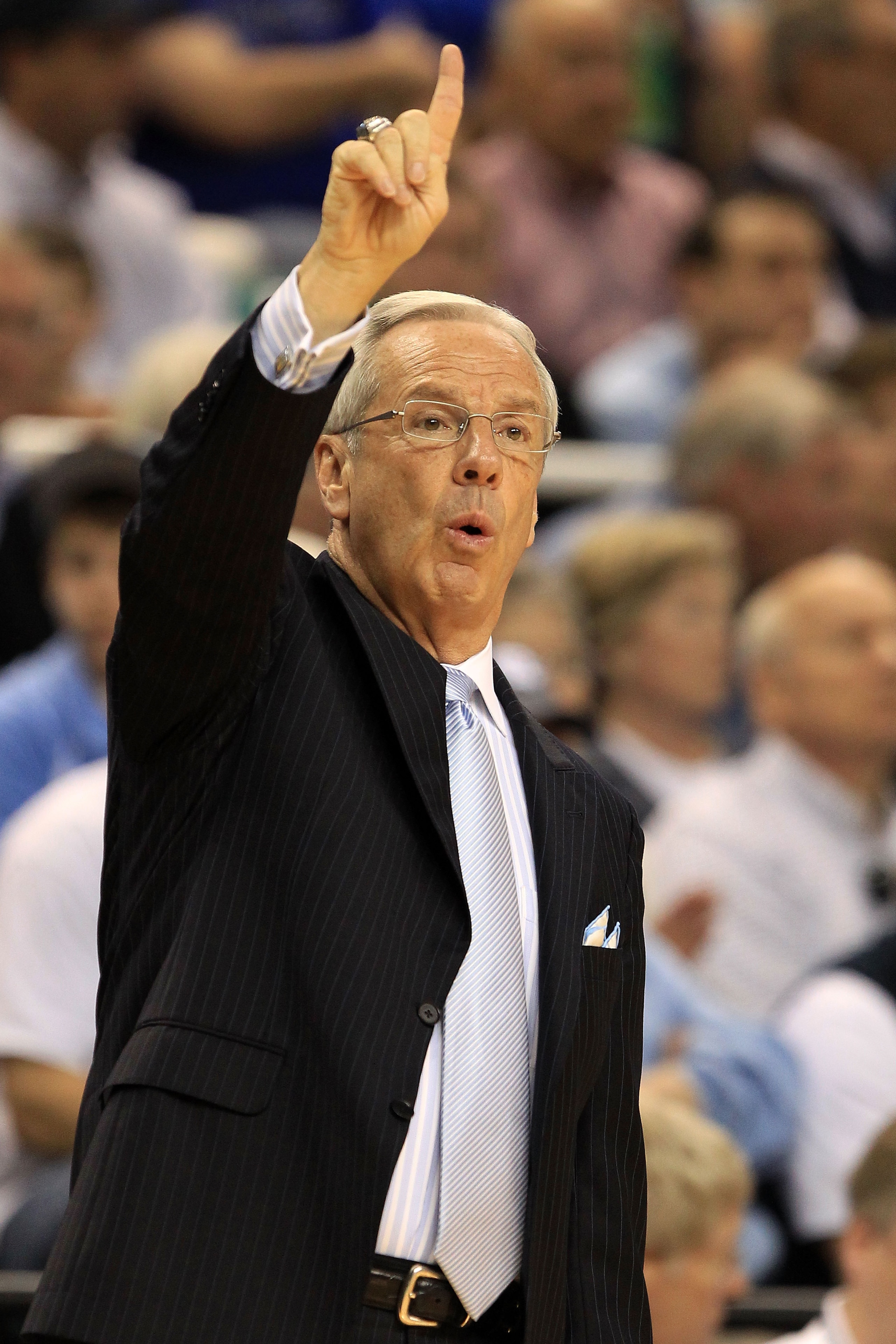 GREENSBORO, NC - MARCH 13:  Head coach Roy Williams of the North Carolina Tar Heels calls a play during the first half of the game against the Duke Blue Devils in the championship game of the 2011 ACC men's basketball tournament at the Greensboro Coliseum