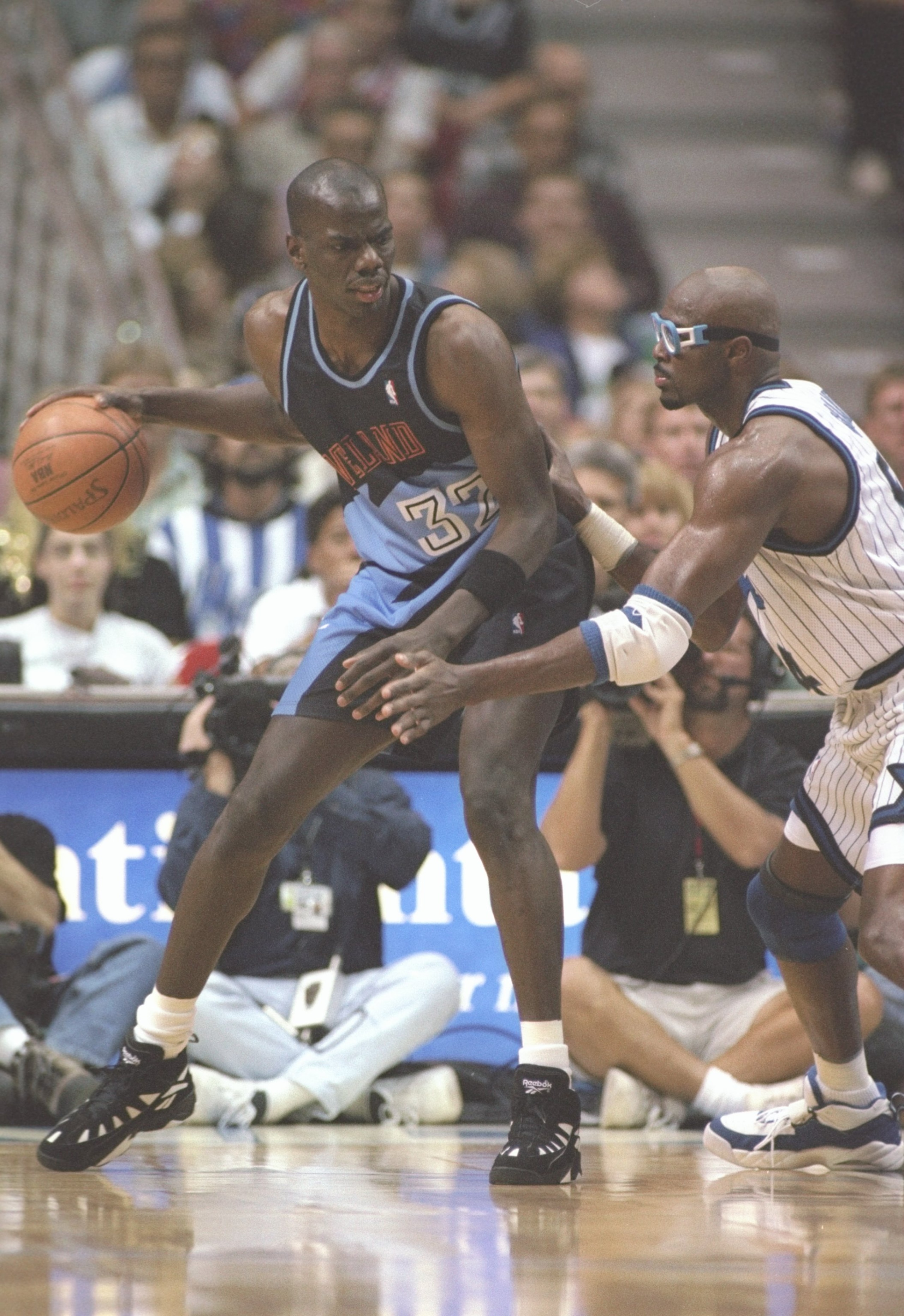 10 Apr 1996:  Forward Tyrone Hill of the Cleveland Cavaliers tries to fend off forward Horace Grant of the Orlando Magic at the Orlando Arena in Orlando, Florida.  The Magic won the game 116-104. Mandatory Credit: Allsport  /Allsport