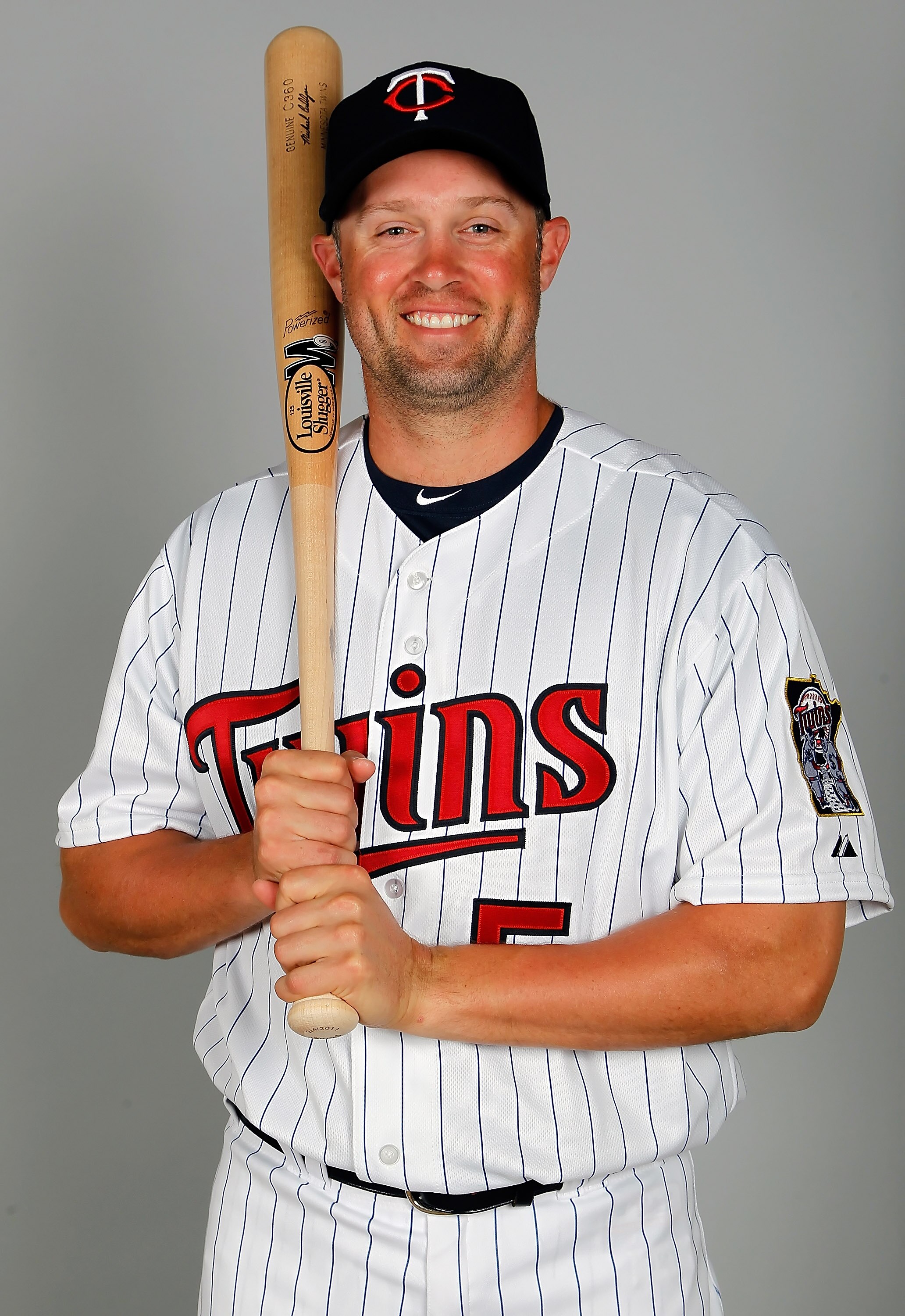 FORT MYERS, FL - FEBRUARY 25:  Outfielder Michael Cuddyer #5 of the Minnesota Twins poses for a photo during photo day at Hammond Stadium on February 25, 2011 in Fort Myers, Florida.  (Photo by J. Meric/Getty Images)