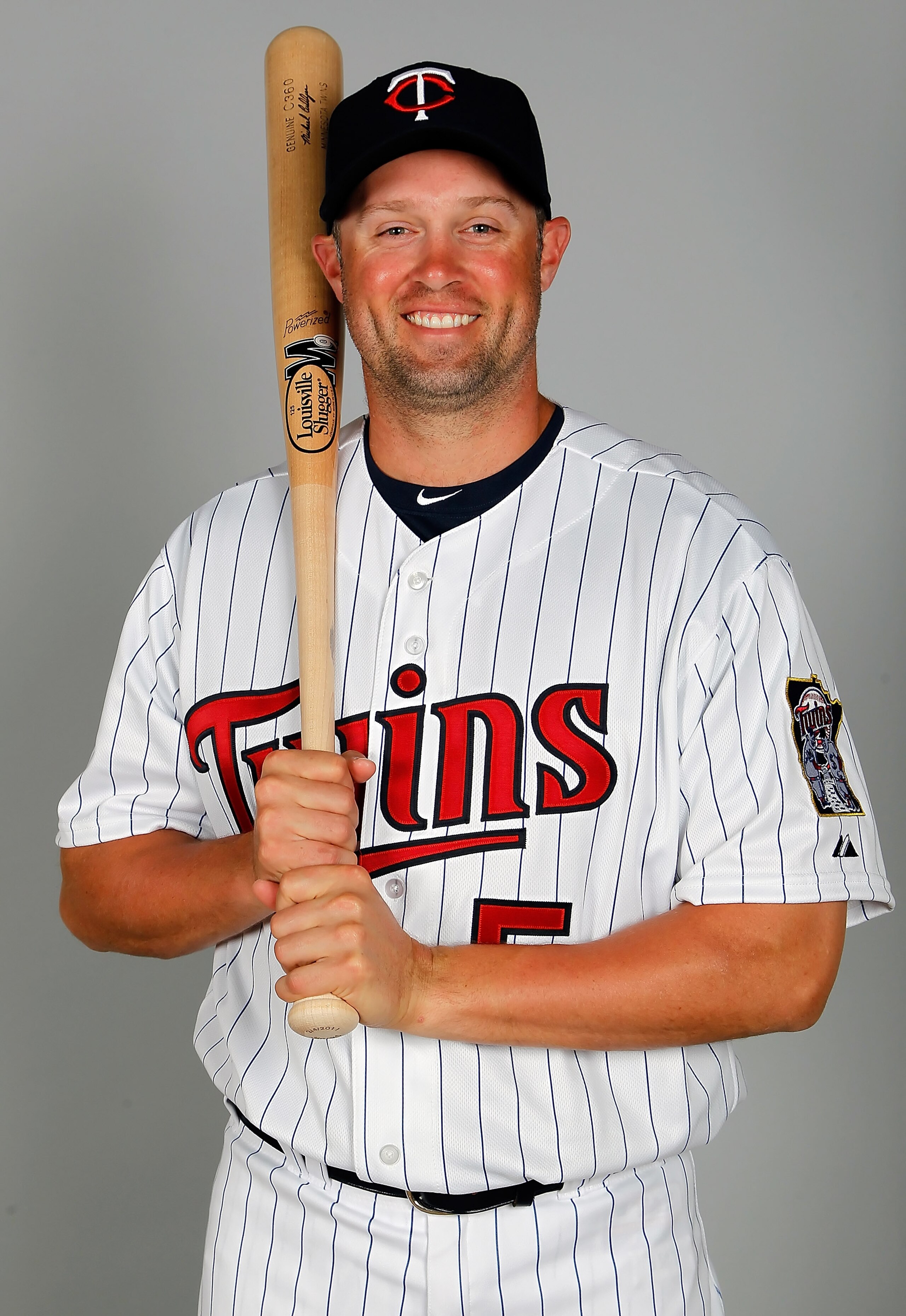 FORT MYERS, FL - FEBRUARY 25:  Outfielder Michael Cuddyer #5 of the Minnesota Twins poses for a photo during photo day at Hammond Stadium on February 25, 2011 in Fort Myers, Florida.  (Photo by J. Meric/Getty Images)