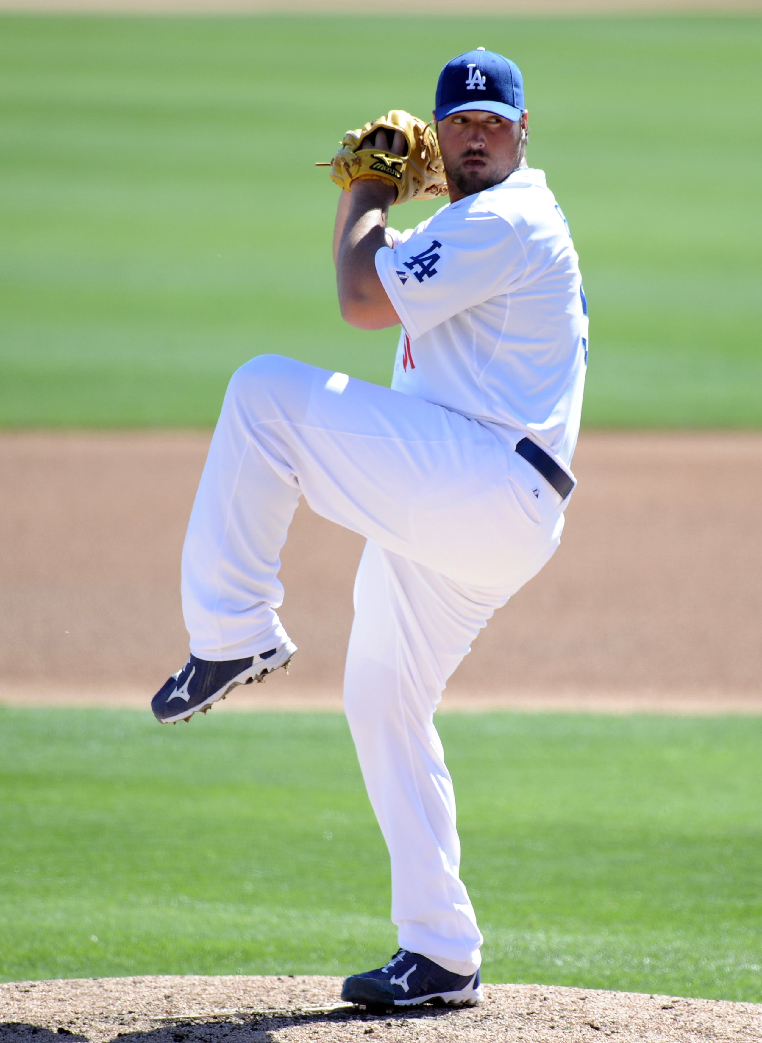 PHOENIX, AZ - FEBRUARY 28:  Jonathan Broxton #51 of the Los Angeles Dodgers pitches during spring training at Camelback Ranch on February 28, 2011 in Phoenix, Arizona.  (Photo by Harry How/Getty Images)