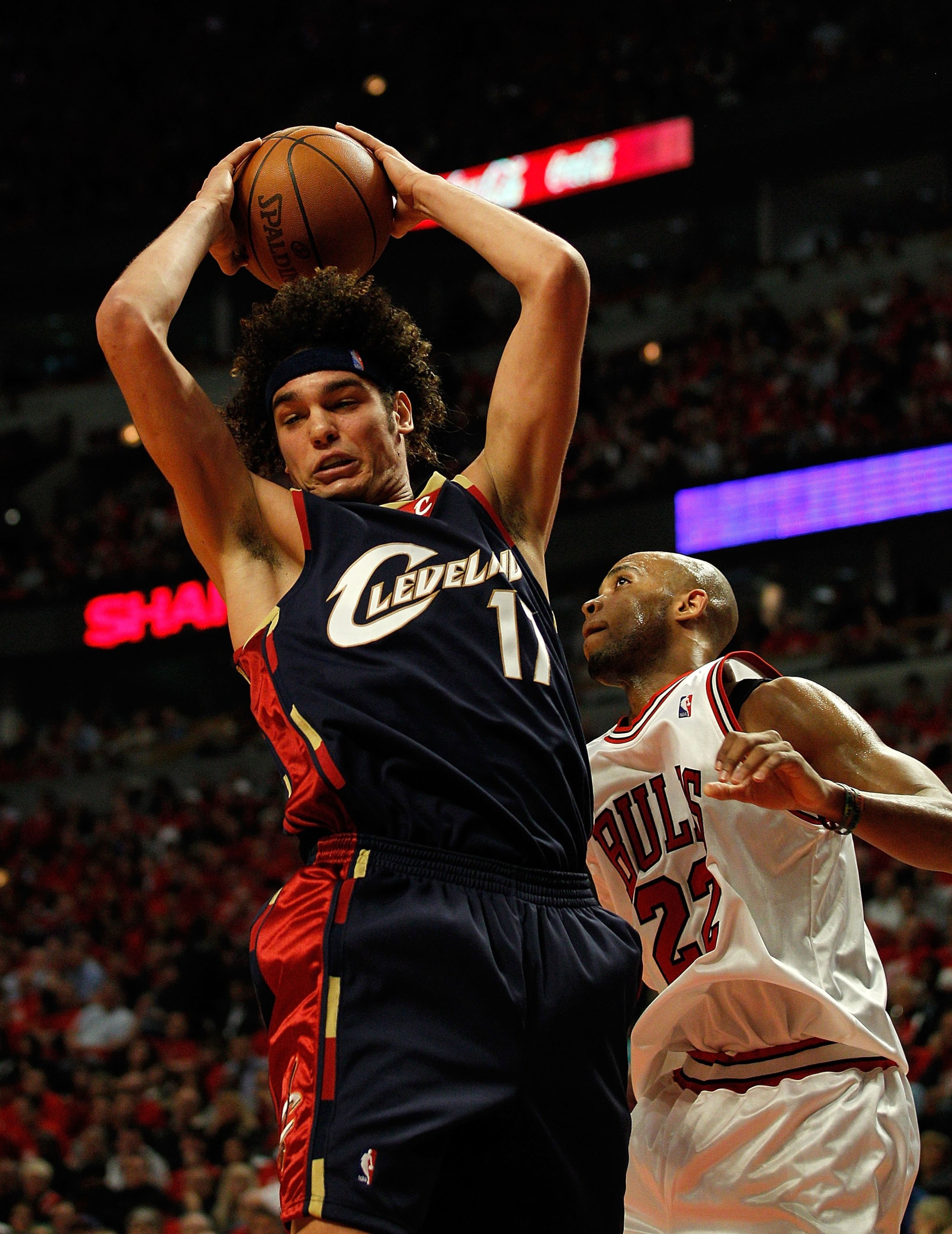 CHICAGO - APRIL 22: Anderson Varejao #17 of the Cleveland Cavaliers grabs a rebound over Taj Gibson #22 of the Chicago Bulls in Game Three of the Eastern Conference Quarterfinals during the 2010 NBA Playoffs at the United Center on April 22, 2010 in Chica