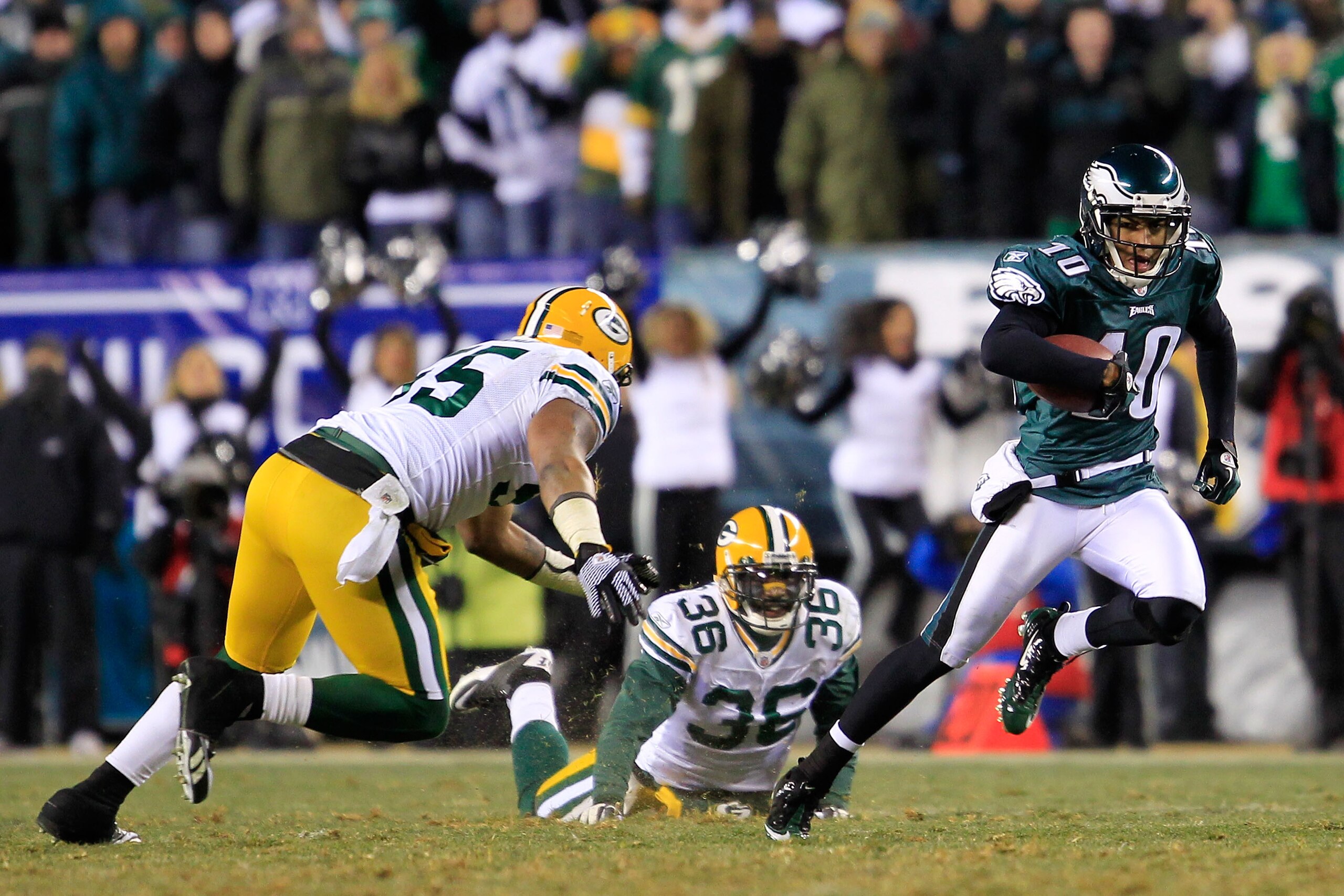 PHILADELPHIA, PA - JANUARY 09:  DeSean Jackson #10 of the Philadelphia Eagles runs down field against Desmond Bishop #55 and Nick Collins #36 of the Green Bay Packers during the 2011 NFC wild card playoff game at Lincoln Financial Field on January 9, 2011