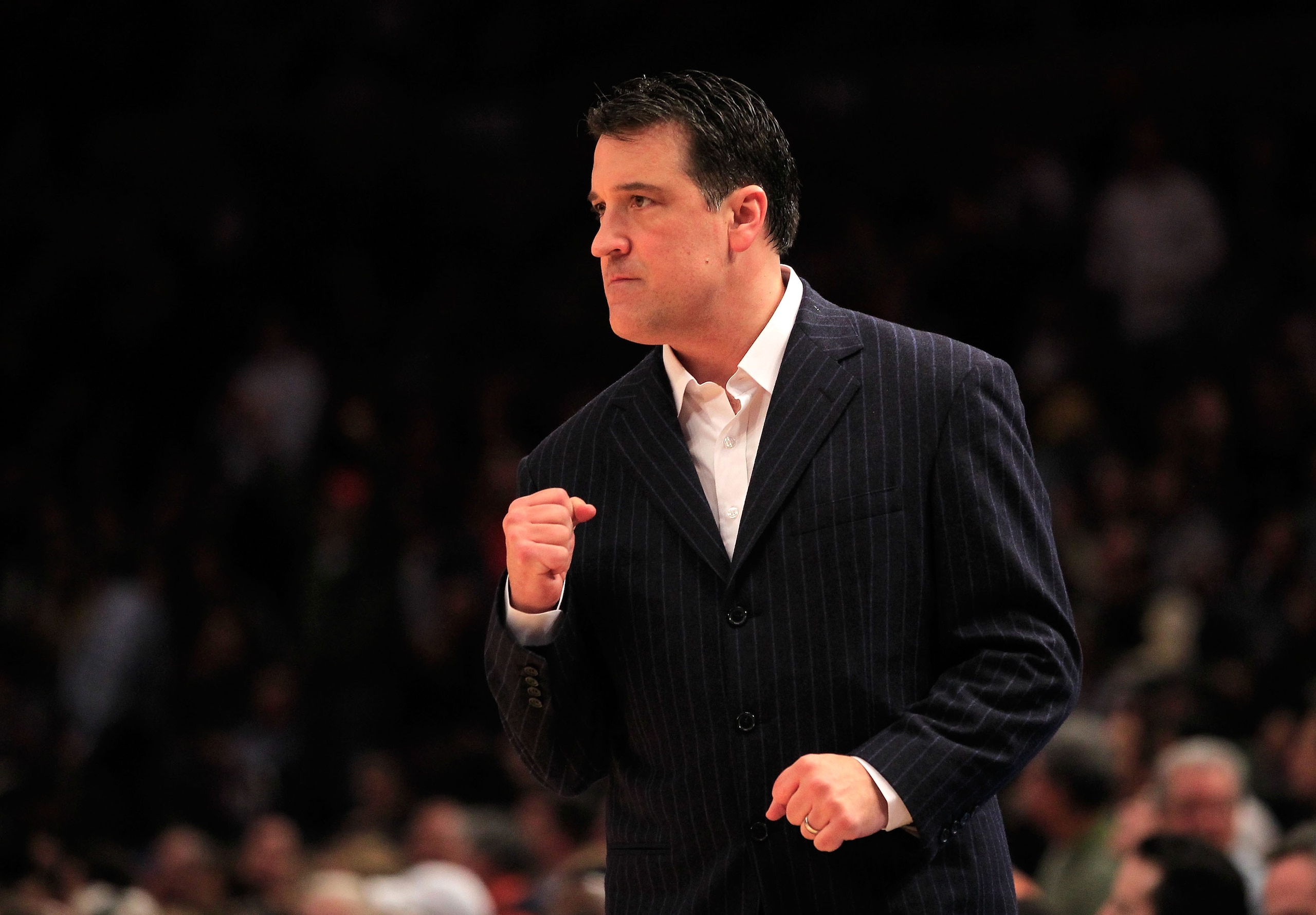 NEW YORK, NY - MARCH 10: head coach Steve Lavin of the St. John's Red Storm reacts from the bench near the end of the first half against the Syracuse Orange during the quarterfinals of the 2011 Big East Men's Basketball Tournament presented by American Ea