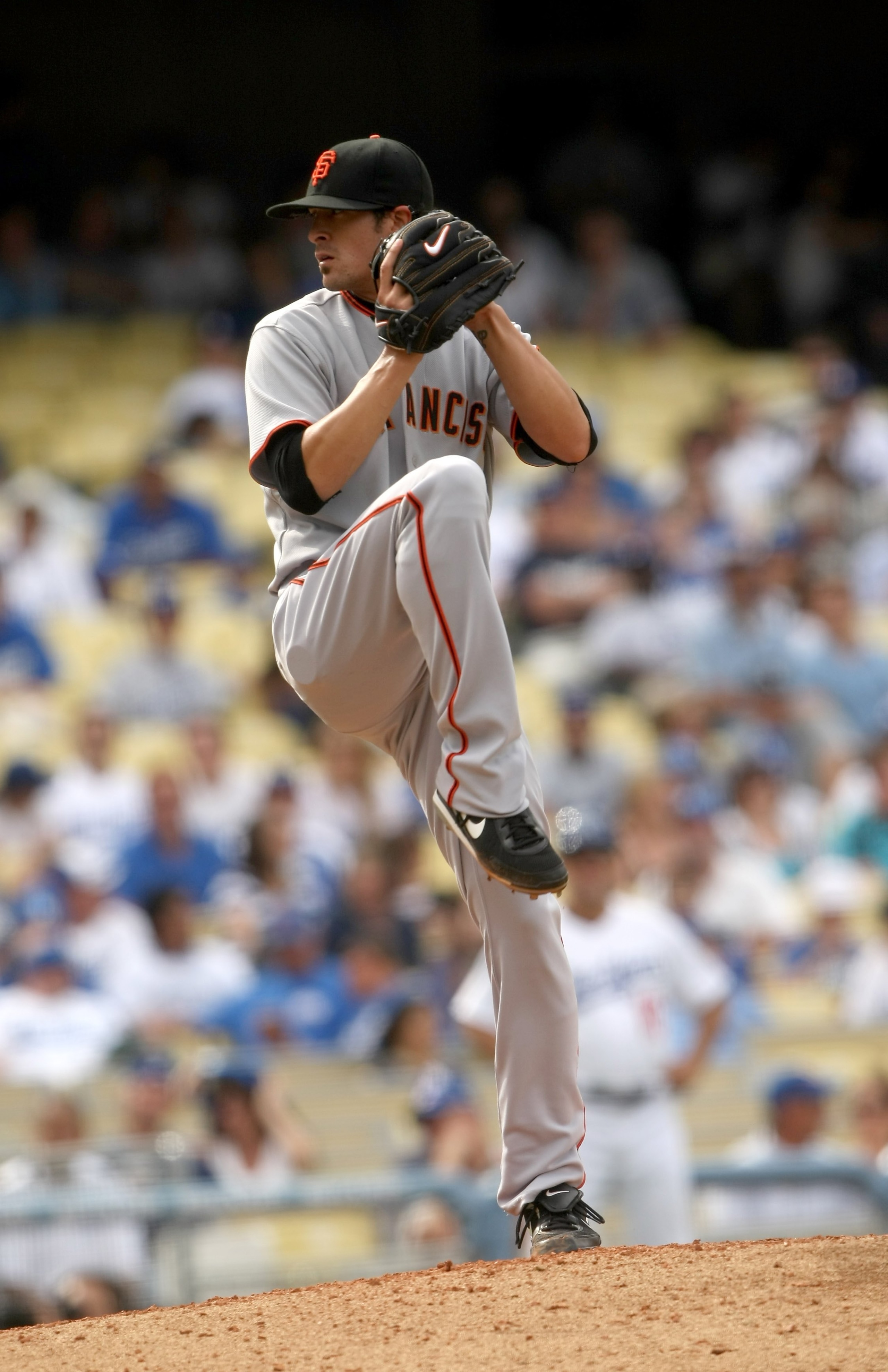 LOS ANGELES, CA - APRIL 13:  Pitcher Alex Hinshaw #43 of the San Francisco Giants throws a pitch during the game with the Los Angeles Dodgers on April 13, 2009 at Dodger Stadiium in Los Angeles, California.  The Dodgers won 11-1.  (Photo by Stephen Dunn/G