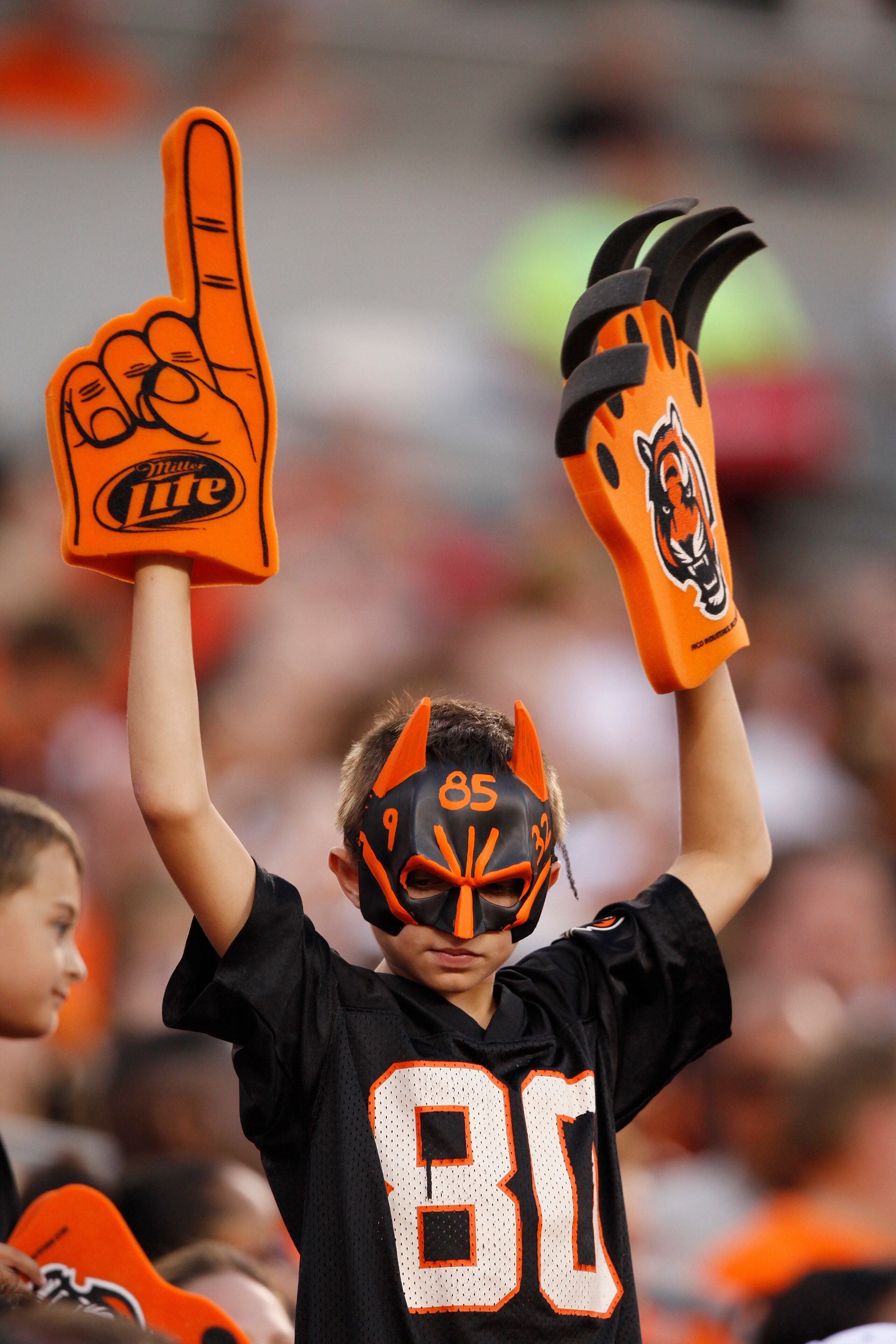 CINCINNATI, OH - AUGUST 15: A Cincinnati Bengals fan cheers during the preseason game against the Denver Broncos at Paul Brown Stadium on August 15, 2010 in Cincinnati, Ohio. The Bengals won 33-24. (Photo by Joe Robbins/Getty Images)