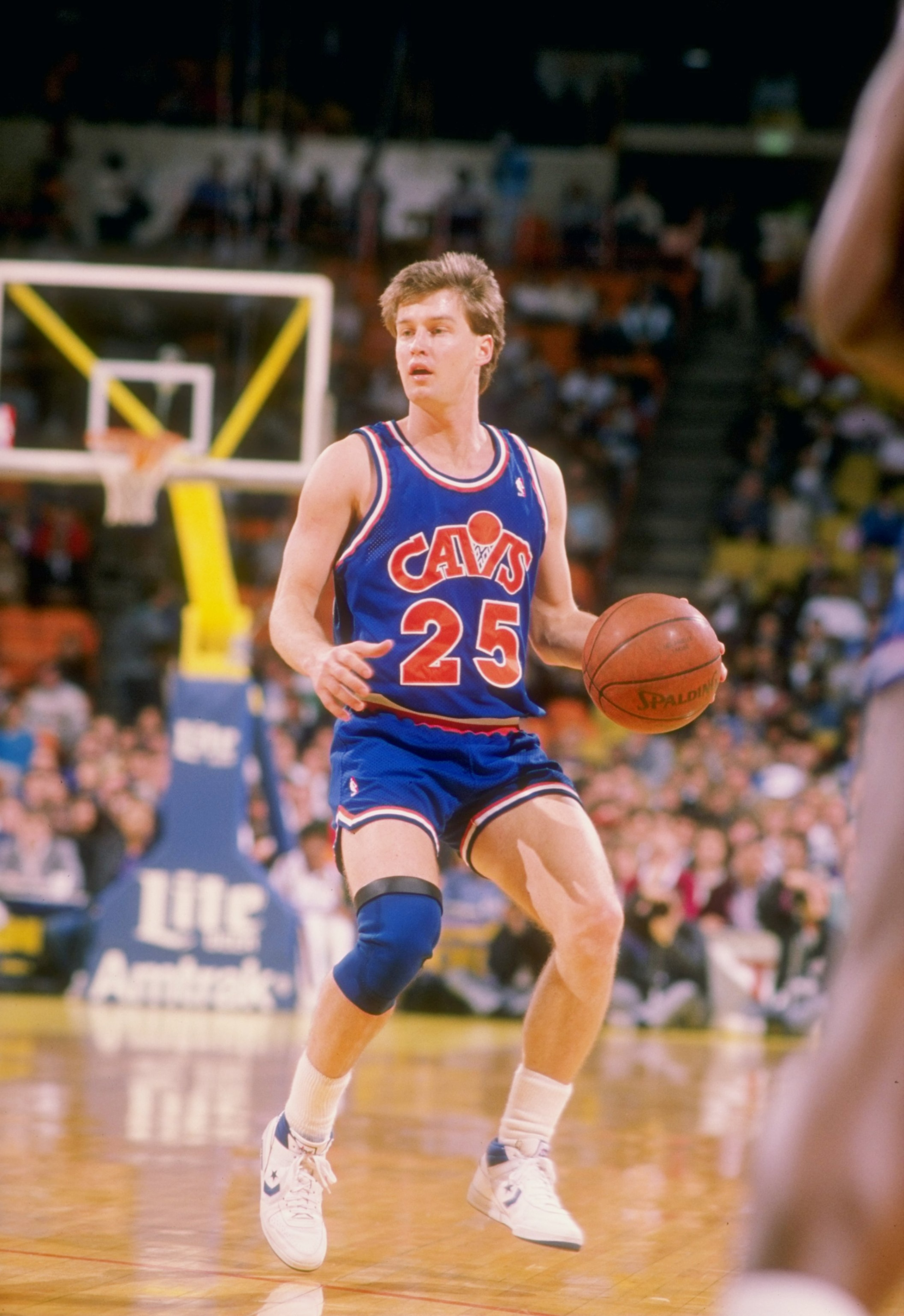 Guard Mark Price of the Cleveland Cavaliers moves the ball during a game.