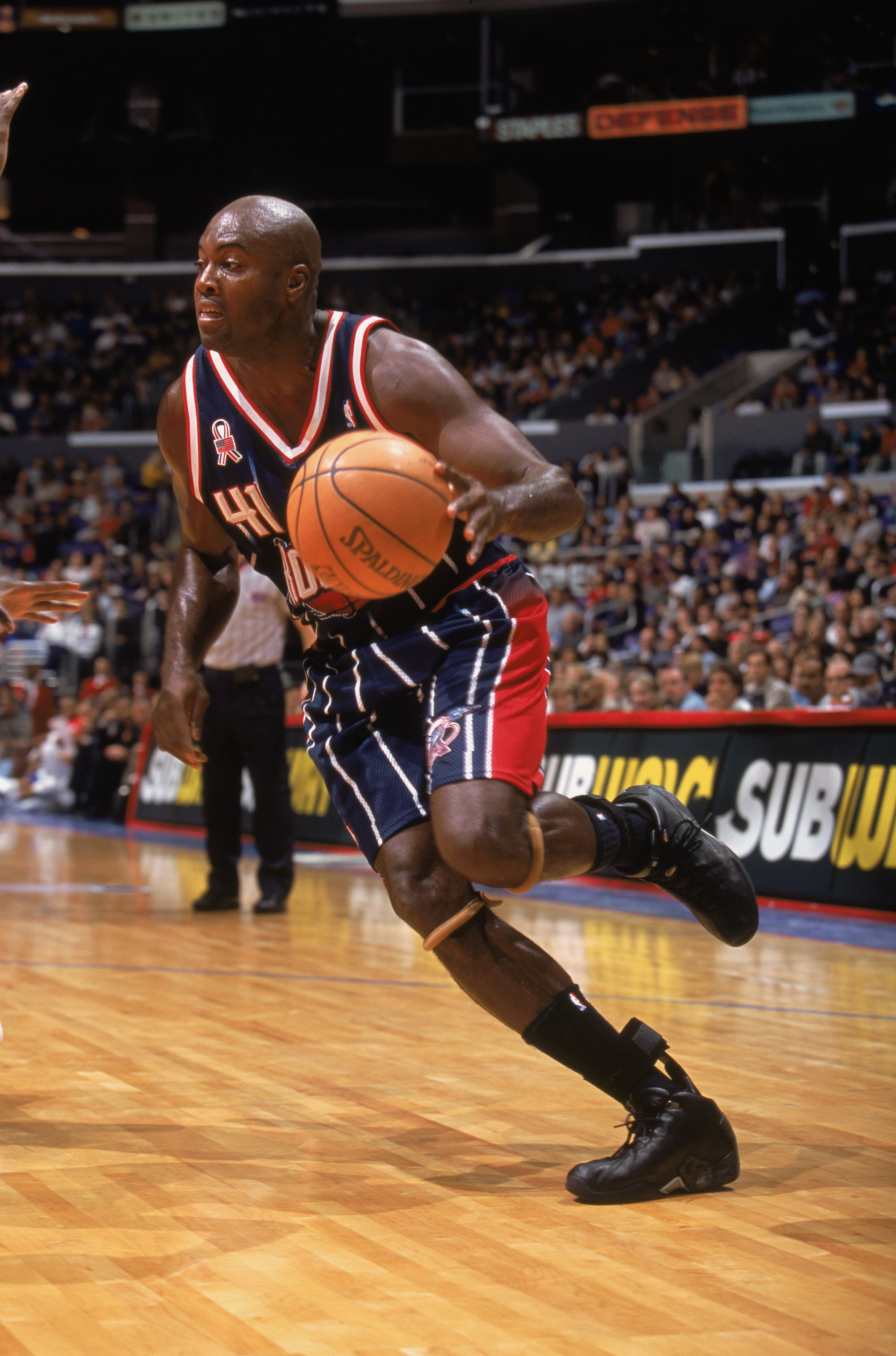 25 Nov 2001:  Forward Glen Rice #41 of the Houston Rockets dribbles the ball during the NBA game against the Los Angeles Clippers at the Staples Center in Los Angeles, California.  The Clippers defeated the Rockets 90-83. NOTE TO USER:  User expressly ack