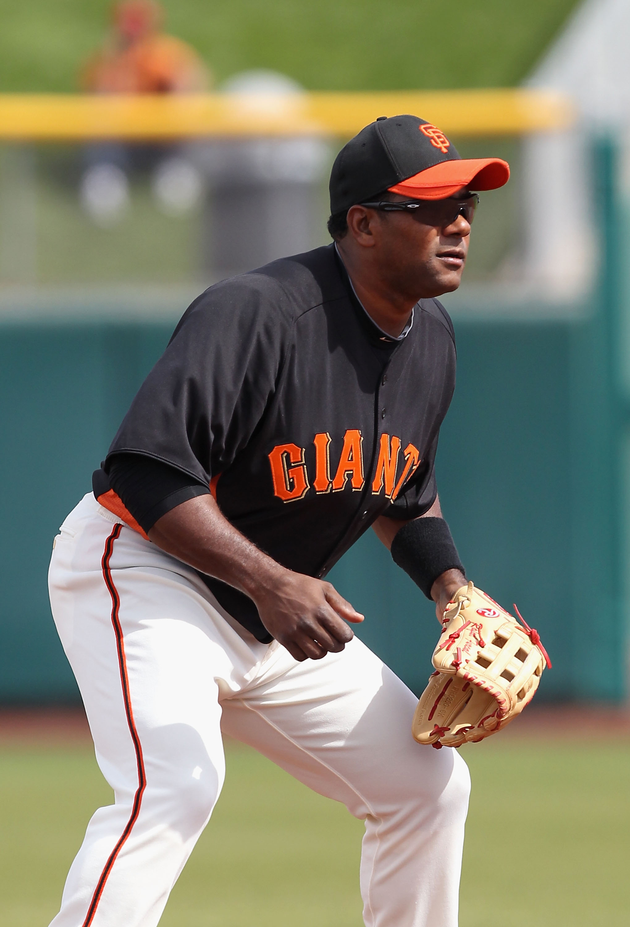 Miguel Tejada, Pablo Sandoval and Freddy Sanchez talk things over in the  seventh inning as the San Francisco Giants take on the Atlanta Braves at  AT&T Park in San Francisco on Saturday. (