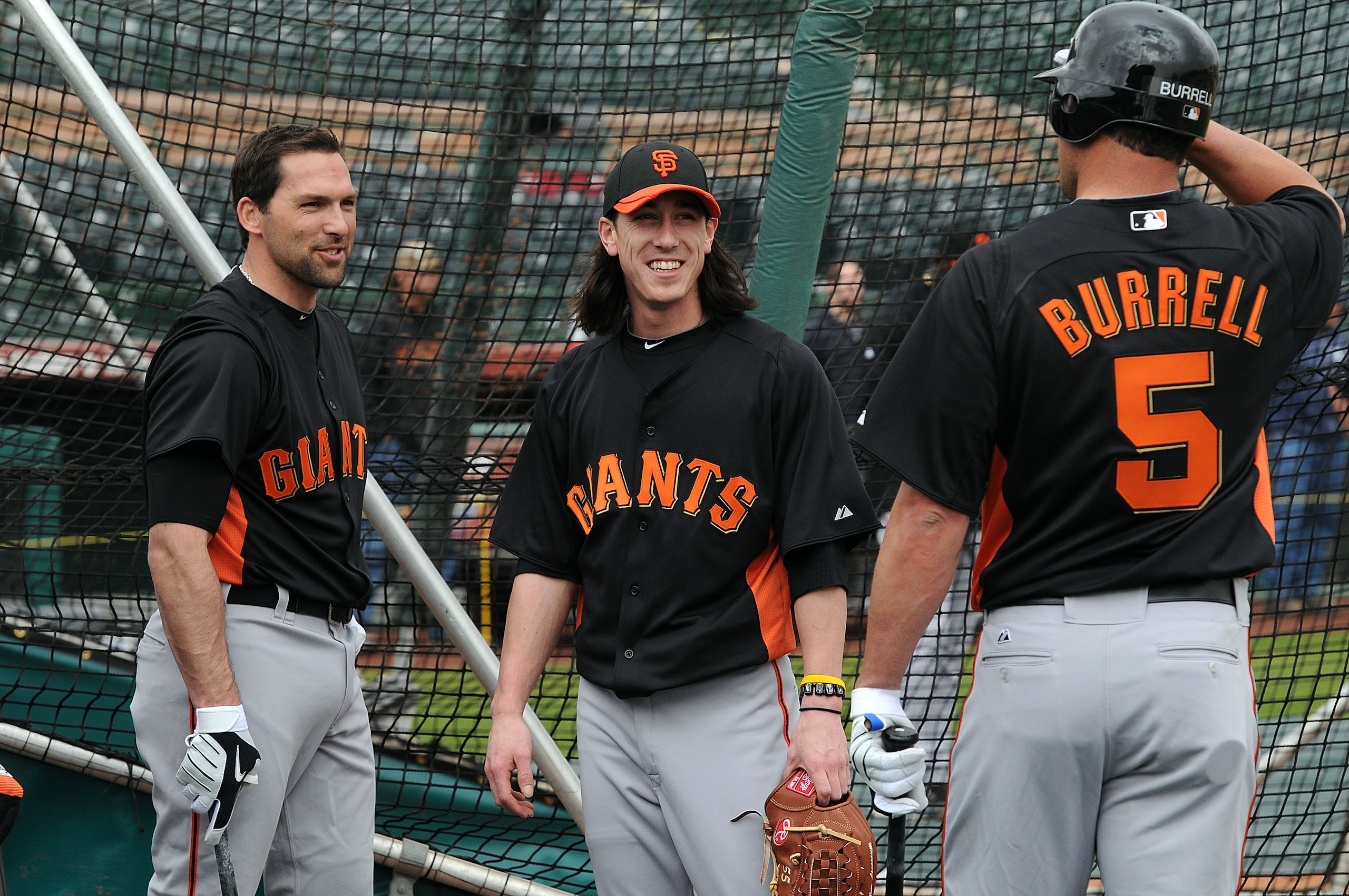 SCOTTSDALE, AZ - FEBRUARY 19: Tim Lincecum #55 of the San Francisco Giants (center) talks to teammates Pat Burrell #5 and Mark DeRosa #7 during batting practice at Scottsdale Stadium on February 19, 2011 in Scottsdale, Arizona. (Photo by Norm Hall/Getty SCOTTSDALE, AZ - FEBRUARY 19: Tim Lincecum #55 of the San Francisco Giants (center) talks to teammates Pat Burrell #5 and Mark DeRosa #7 during batting practice at Scottsdale Stadium on February 19, 2011 in Scottsdale, Arizona. (Photo by Norm Hall/Getty