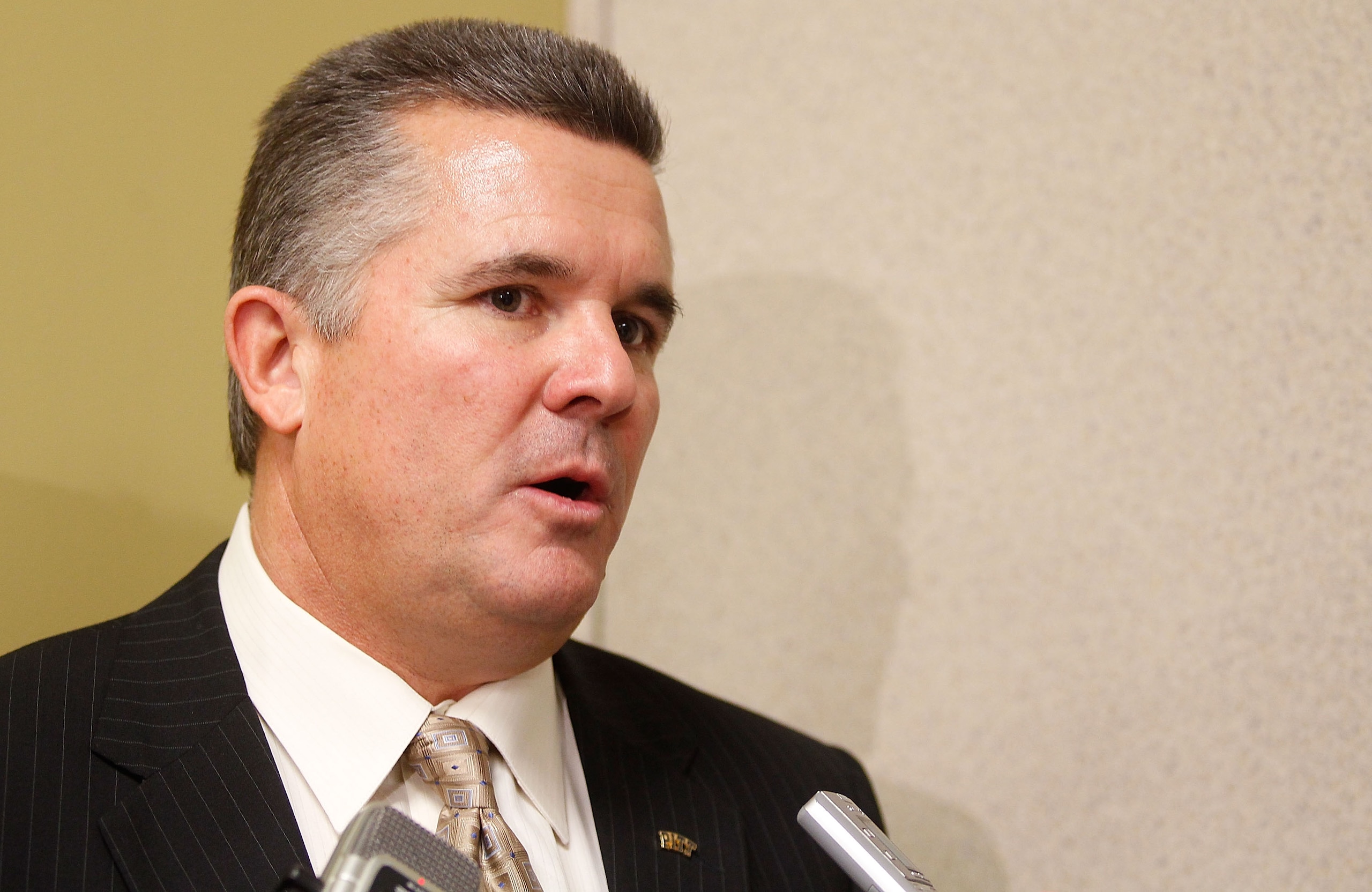 PITTSBURGH, PA  - JANUARY 11:  The new University of Pittsburgh head football coach Todd Graham speaks to the media during a press conference at the University of Pittsburgh Panthers South Side training facility on January 11, 2011 in Pittsburgh, Pennsylv