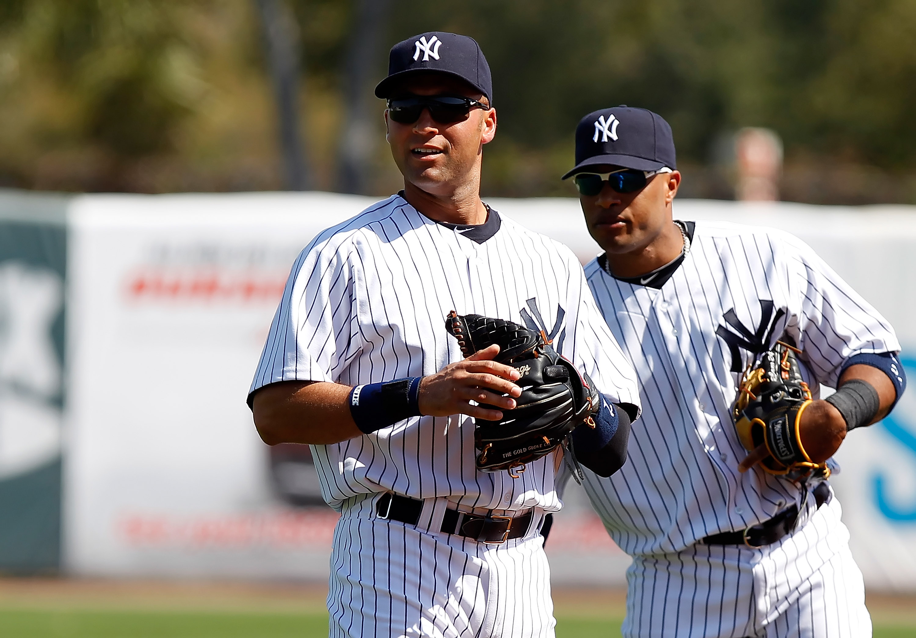 New York Yankees Derek Jeter and Melky Cabrera join hands after the game  against the Chicago White Sox at Yankee Stadium in New York City on  September 17, 2008. The Yankees defeated