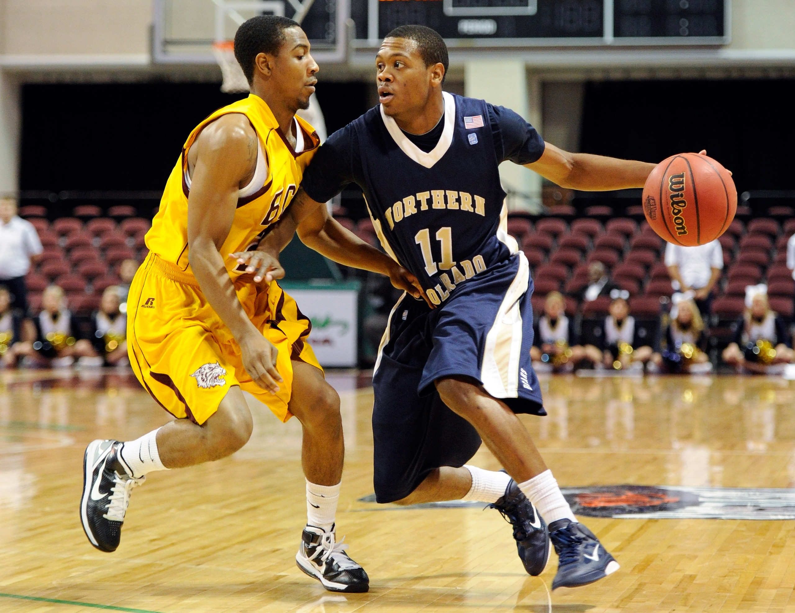 LAS VEGAS - NOVEMBER 27:  Elliott Lloyd #11 of the Northern Colorado Bears brings the ball up the court against Kevin Dukes #21 of the Bethune-Cookman Wildcats during the fourth round of the Las Vegas Invitational at The Orleans Arena November 27, 2010 in