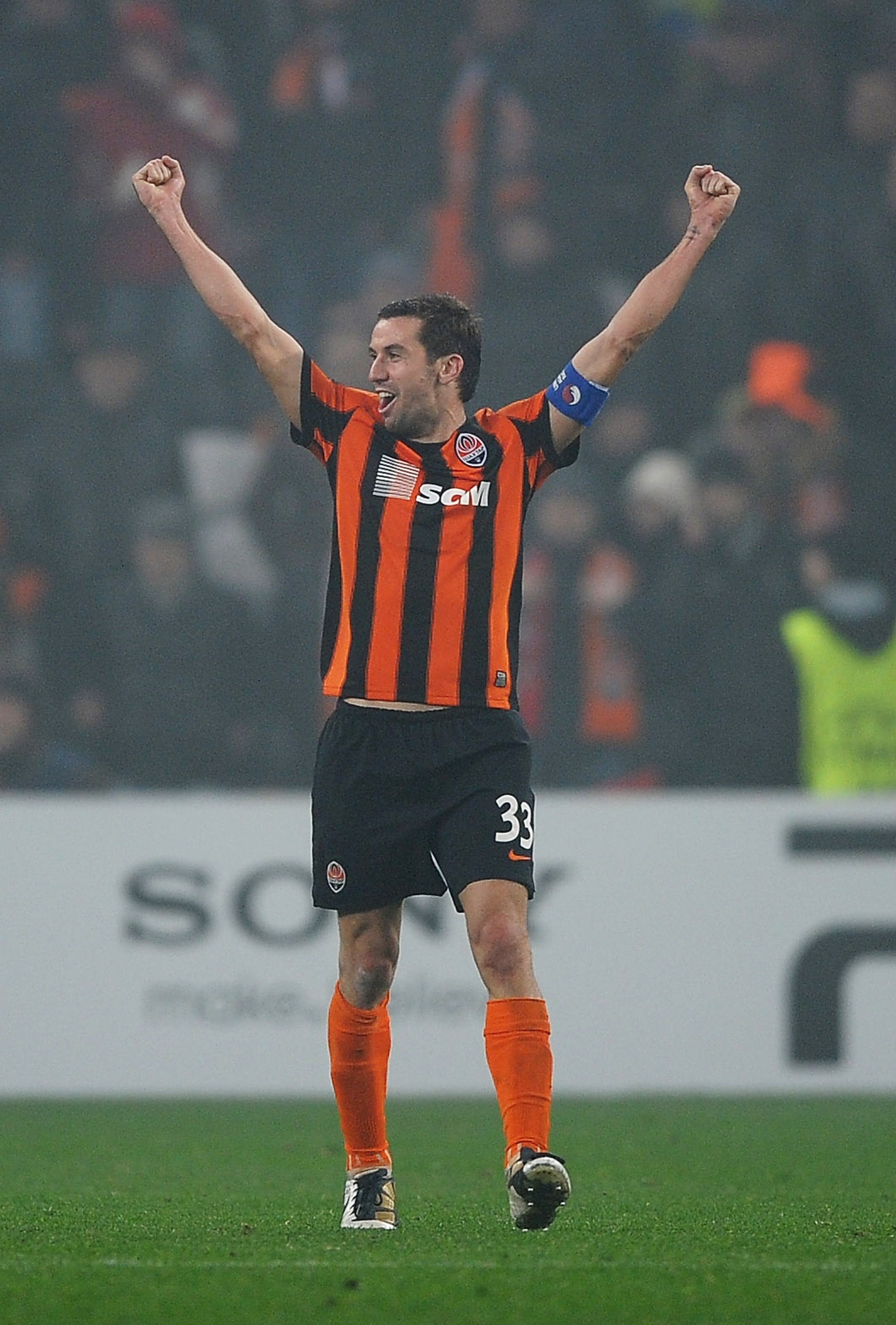 DONETSK, UKRAINE - NOVEMBER 03:  Darijo Srna of Shakhtar Donetsk celebrates victory after the Champions League Group H match between FC Shakhtar Donetsk and Arsenal at the Donbass Arena on November 3, 2010 in Donetsk, Ukraine.  (Photo by Laurence Griffith