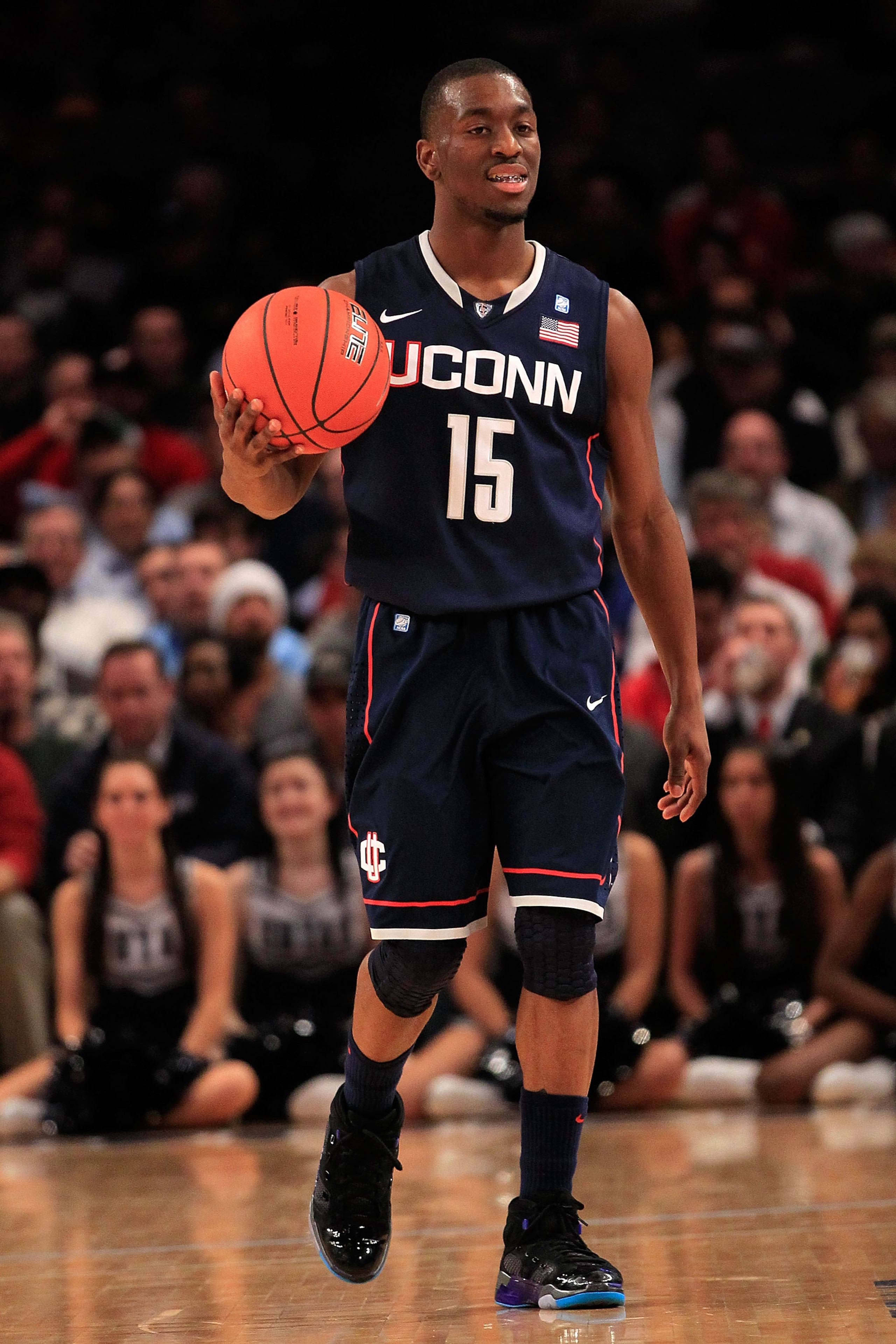 NEW YORK, NY - MARCH 09: Kemba Walker #15 of the Connecticut Huskies dribbles the ball against the Georgetown Hoyas during the second round of the 2011 Big East Men's Basketball Tournament presented by American Eagle Outfitters at Madison Square Garden o NEW YORK, NY - MARCH 09: Kemba Walker #15 of the Connecticut Huskies dribbles the ball against the Georgetown Hoyas during the second round of the 2011 Big East Men's Basketball Tournament presented by American Eagle Outfitters at Madison Square Garden o