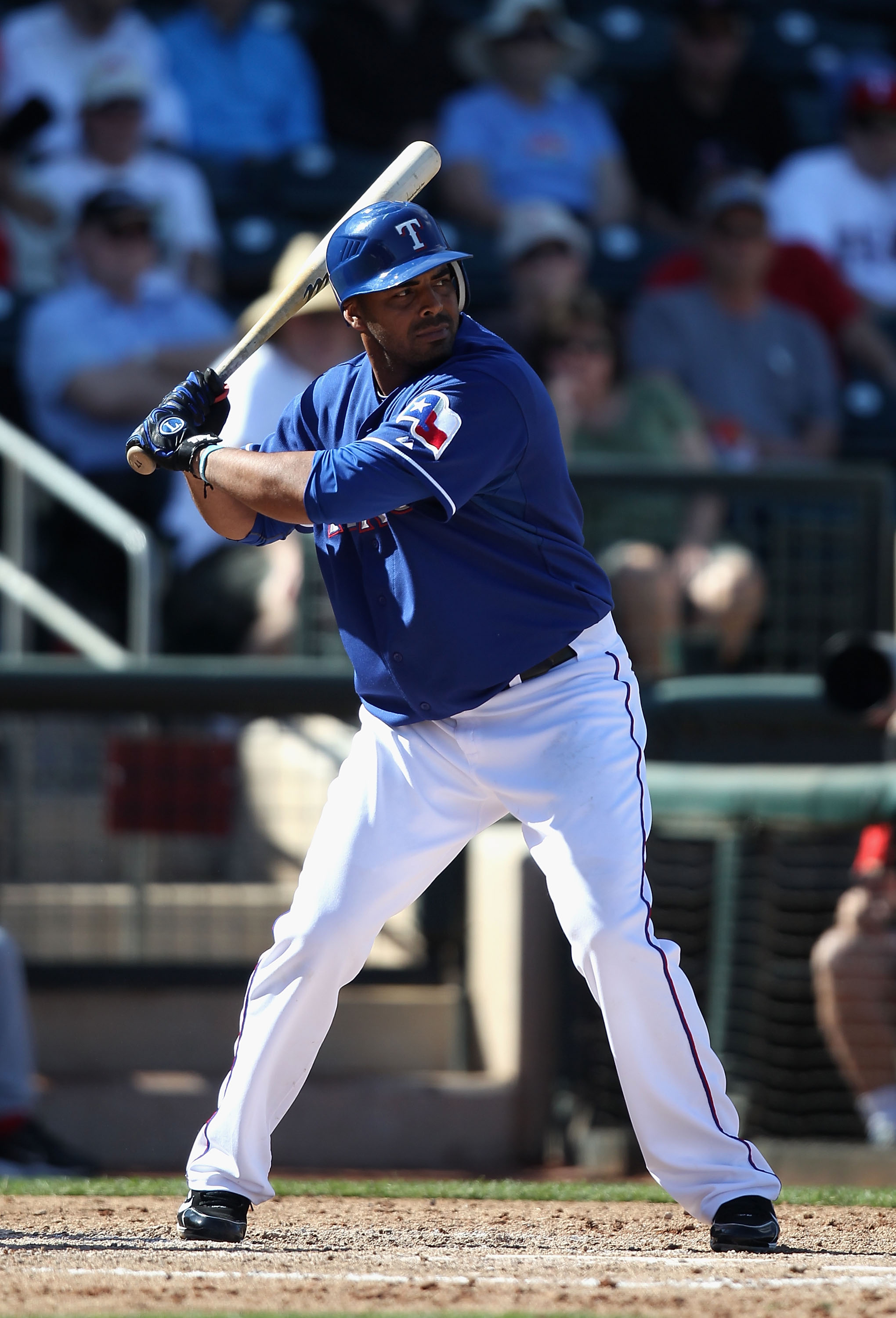 SURPRISE, AZ - MARCH 02:  Nelson Cruz #17 of the Texas Rangers bats against the Los Angeles Angels of Anaheim during the spring training game at Surprise Stadium on March 2, 2011 in Surprise, Arizona.  (Photo by Christian Petersen/Getty Images)