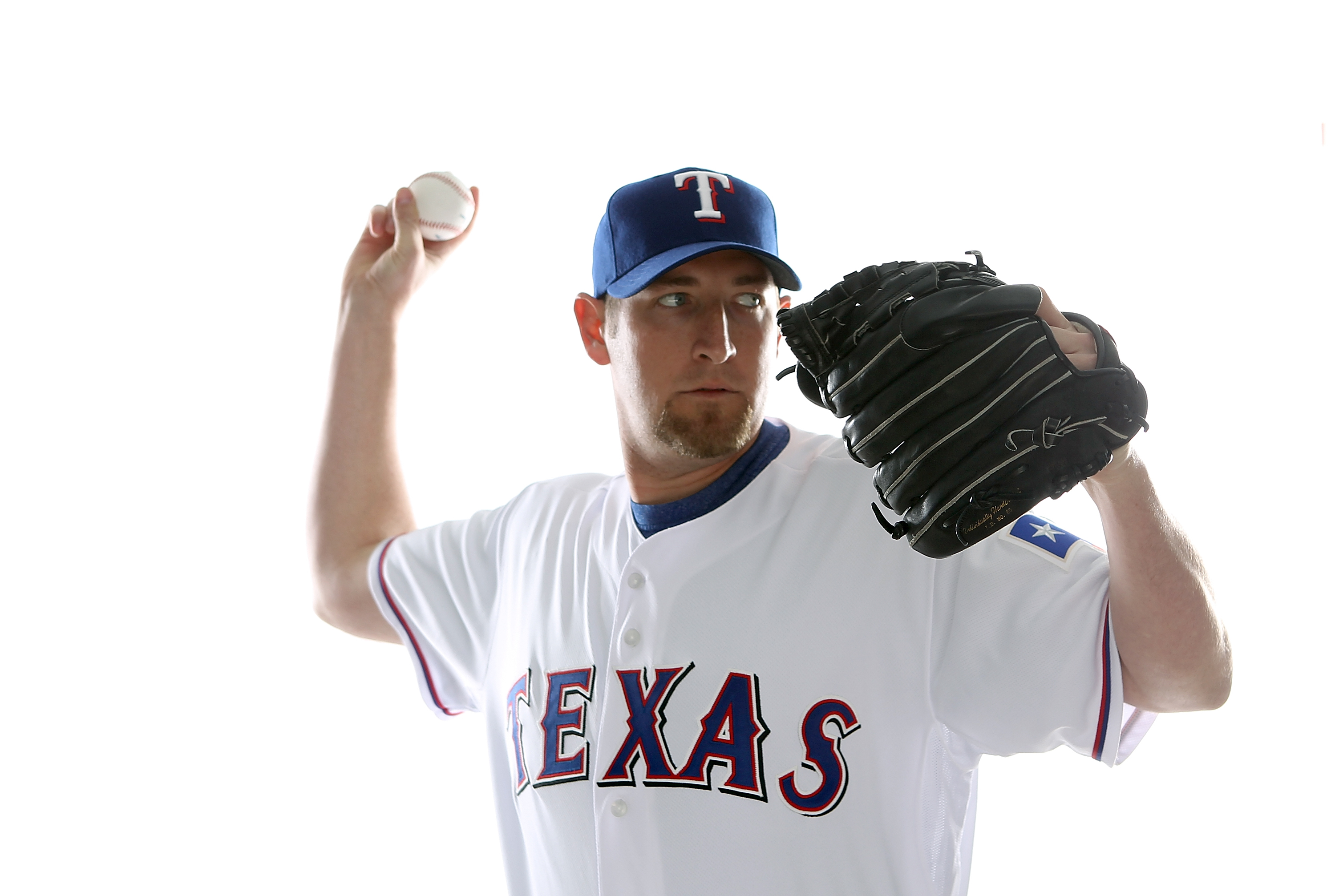 SURPRISE, AZ - FEBRUARY 25:  Brandon Webb #33 of the Texas Rangers poses for a portrait during Spring Training Media Day on February 25, 2011 at Surprise Stadium in Surprise, Arizona.  (Photo by Jonathan Ferrey/Getty Images)