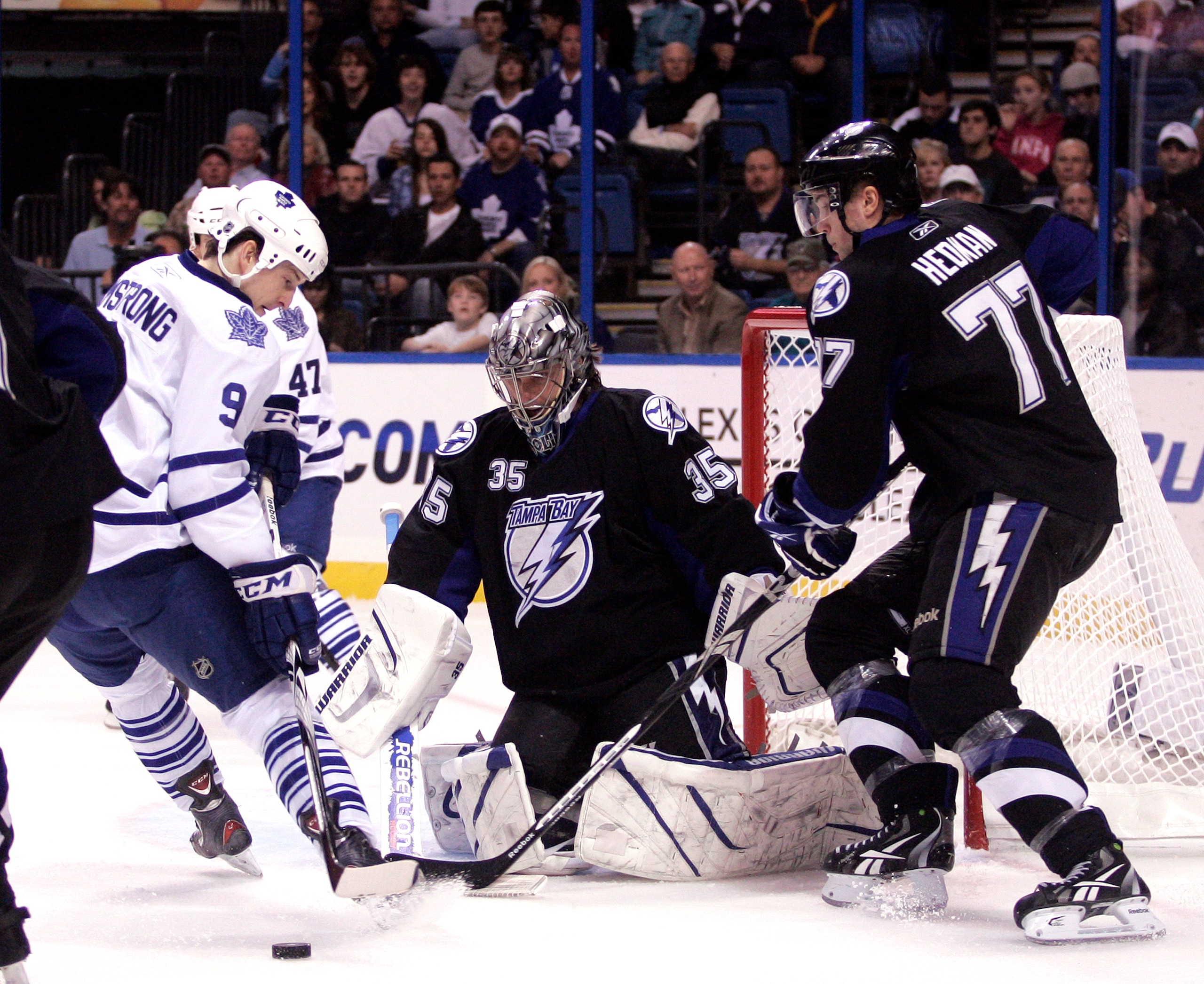TAMPA, FL - JANUARY 25:  Dwayne Roloson #35 of the Tampa Bay Lightning makes a save against the Toronto Maple Leafs at St. Pete Times Forum on January 25, 2011 in Tampa, Florida.  (Photo by Justin K. Aller/Getty Images)