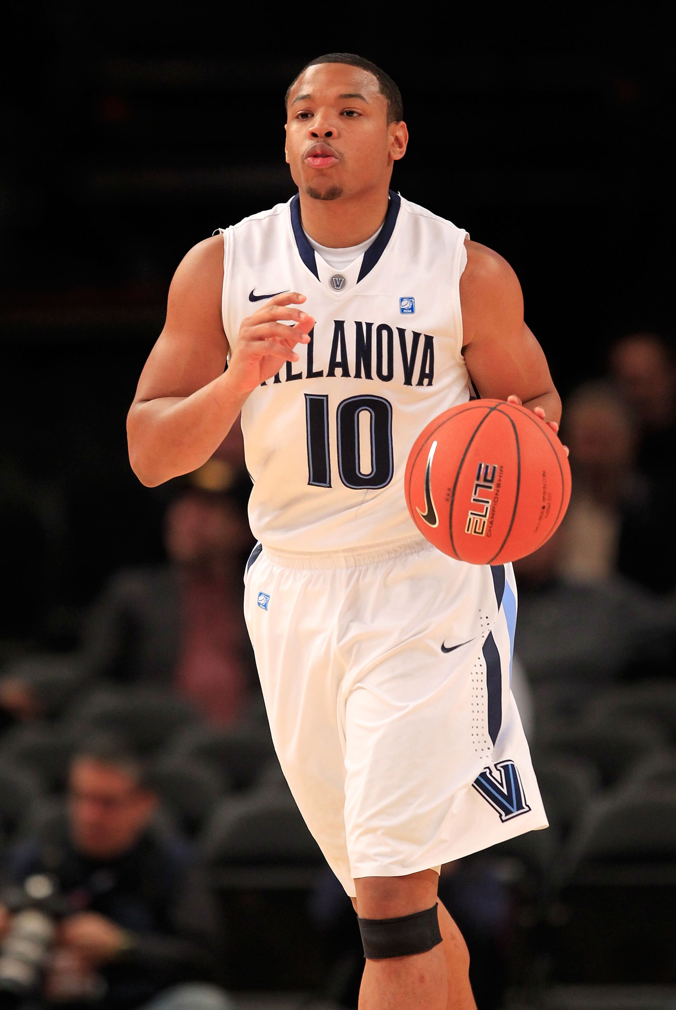 NEW YORK, NY - MARCH 08: Corey Fisher #10 of the Villanova Wildcats brings the ball up court against the South Florida Bulls during the first round of the 2011 Big East Men's Basketball Tournament presented by American Eagle Outfitters at Madison Square G