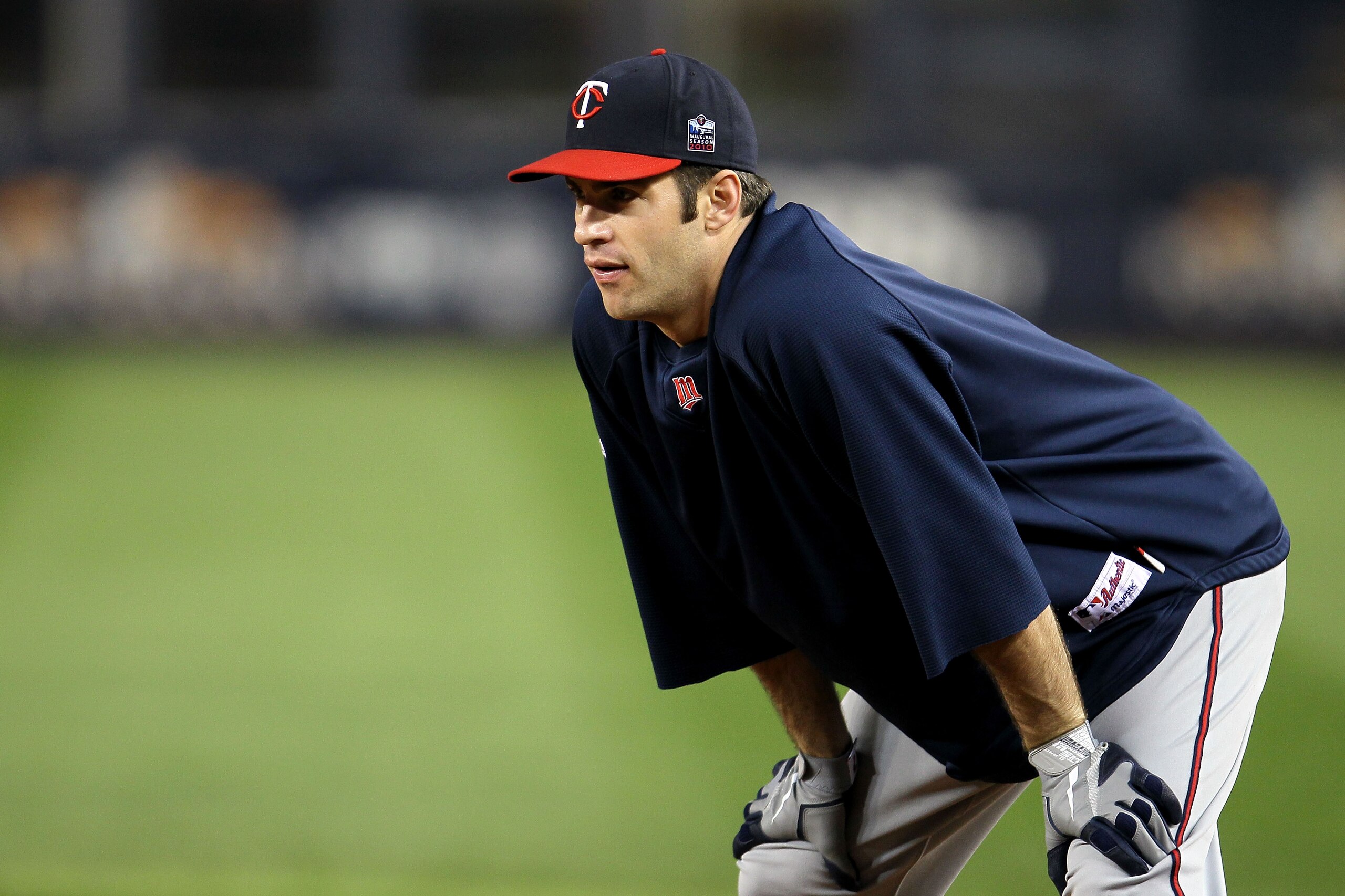 NEW YORK - OCTOBER 09:  Joe Mauer #7 of the Minnesota Twins looks on during batting practice against the New York Yankees during Game Three of the ALDS part of the 2010 MLB Playoffs at Yankee Stadium on October 9, 2010 in the Bronx borough of New York Cit